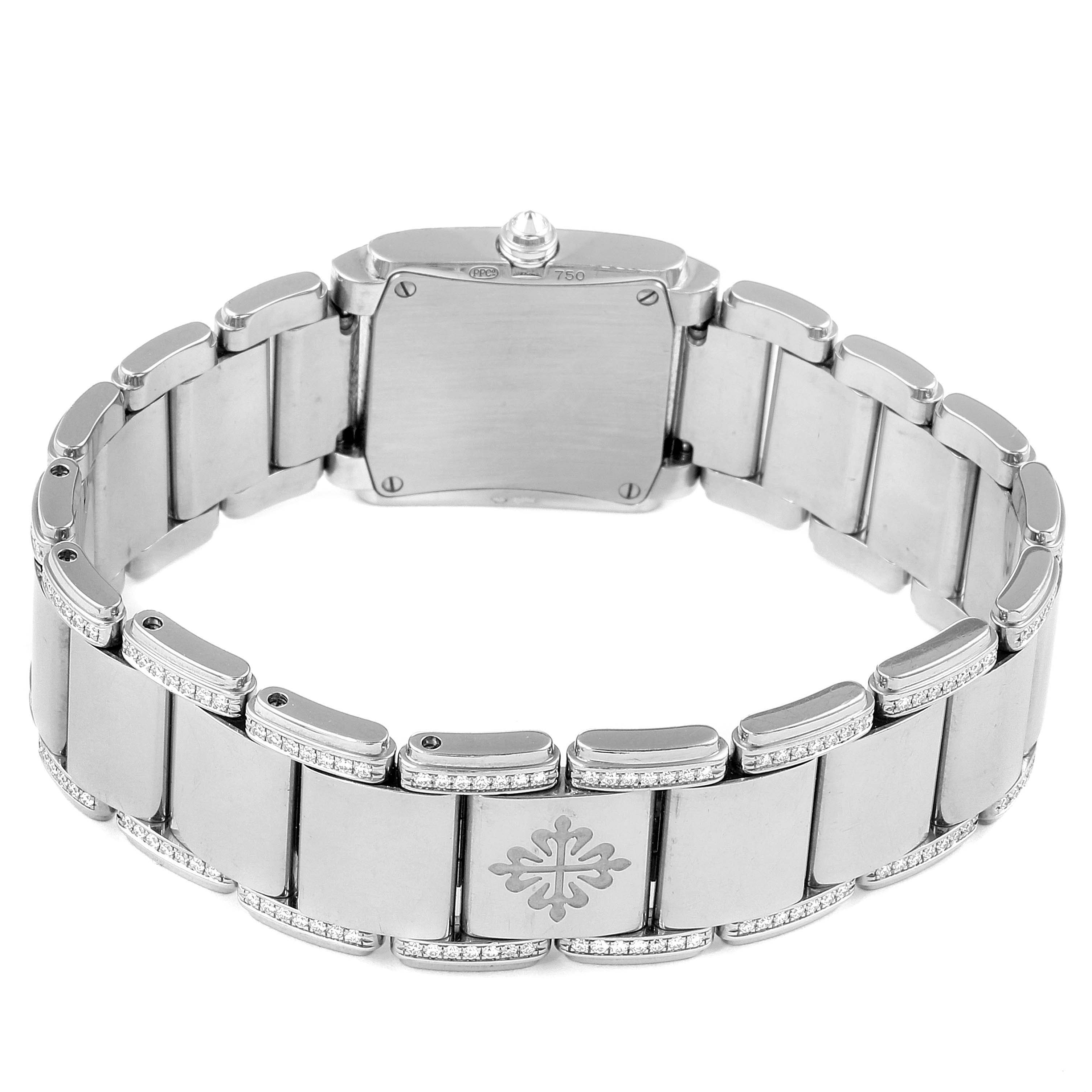 The image shows the back and bracelet of a Patek Philippe Twenty-4 4908/310G Women's White Gold Silver Dial 4908/310G Women's White Gold Silver Dial watch, highlighting the links and clasp.