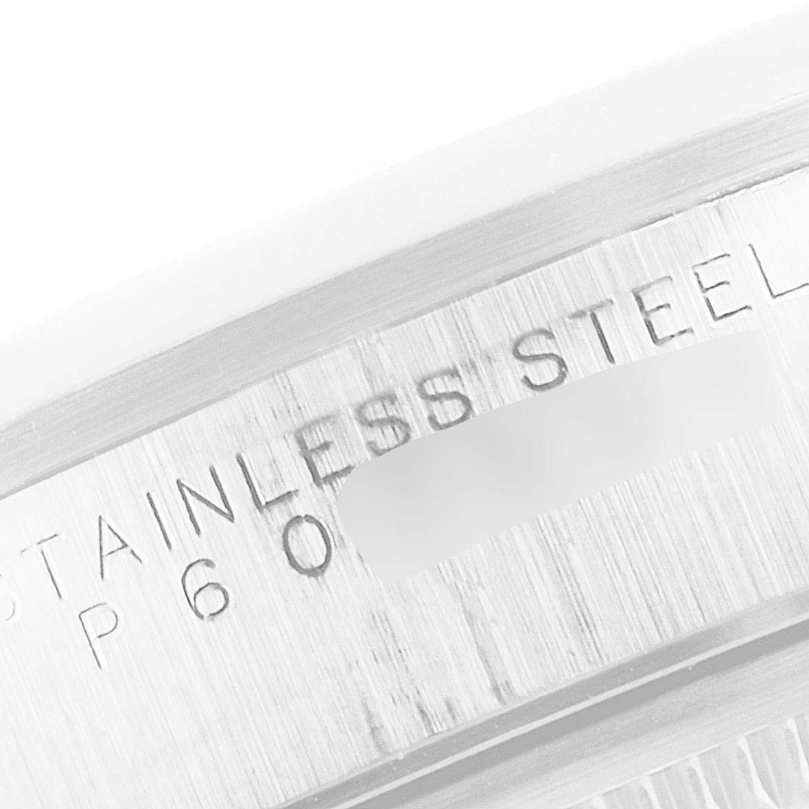 The image shows a close-up of the stainless steel inscription on the case back of a Rolex Air-King 14000 Men's Stainless Steel Silver Dial 14000 Men's Stainless Steel Silver Dial watch.