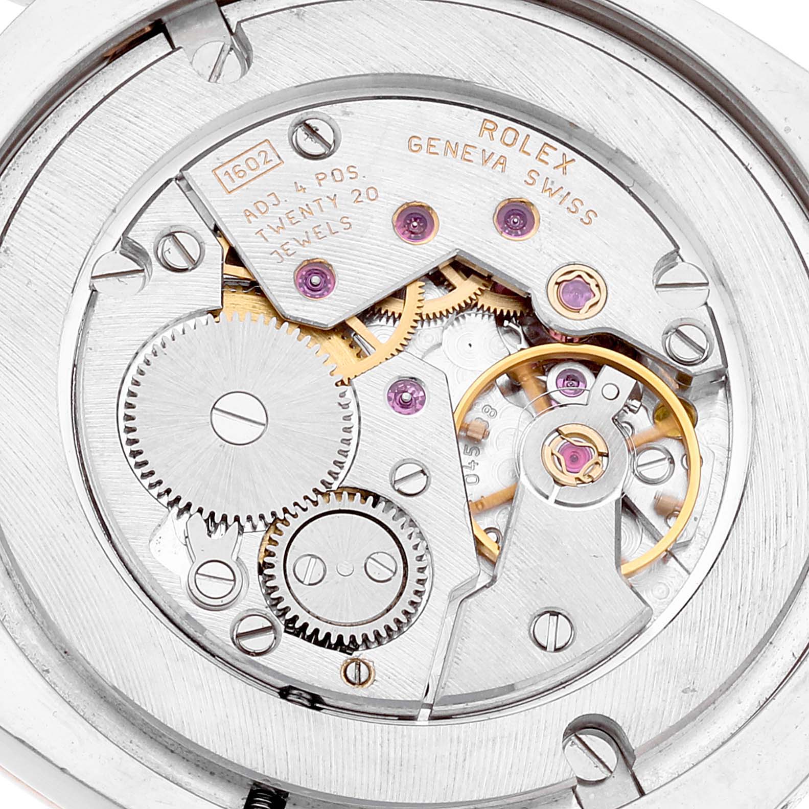 The image shows the open case back of a Rolex Cellini 4233 Men
s Rose Gold White Dial 4233 Men
s Rose Gold White Dial model, revealing the intricate mechanics and movement parts.