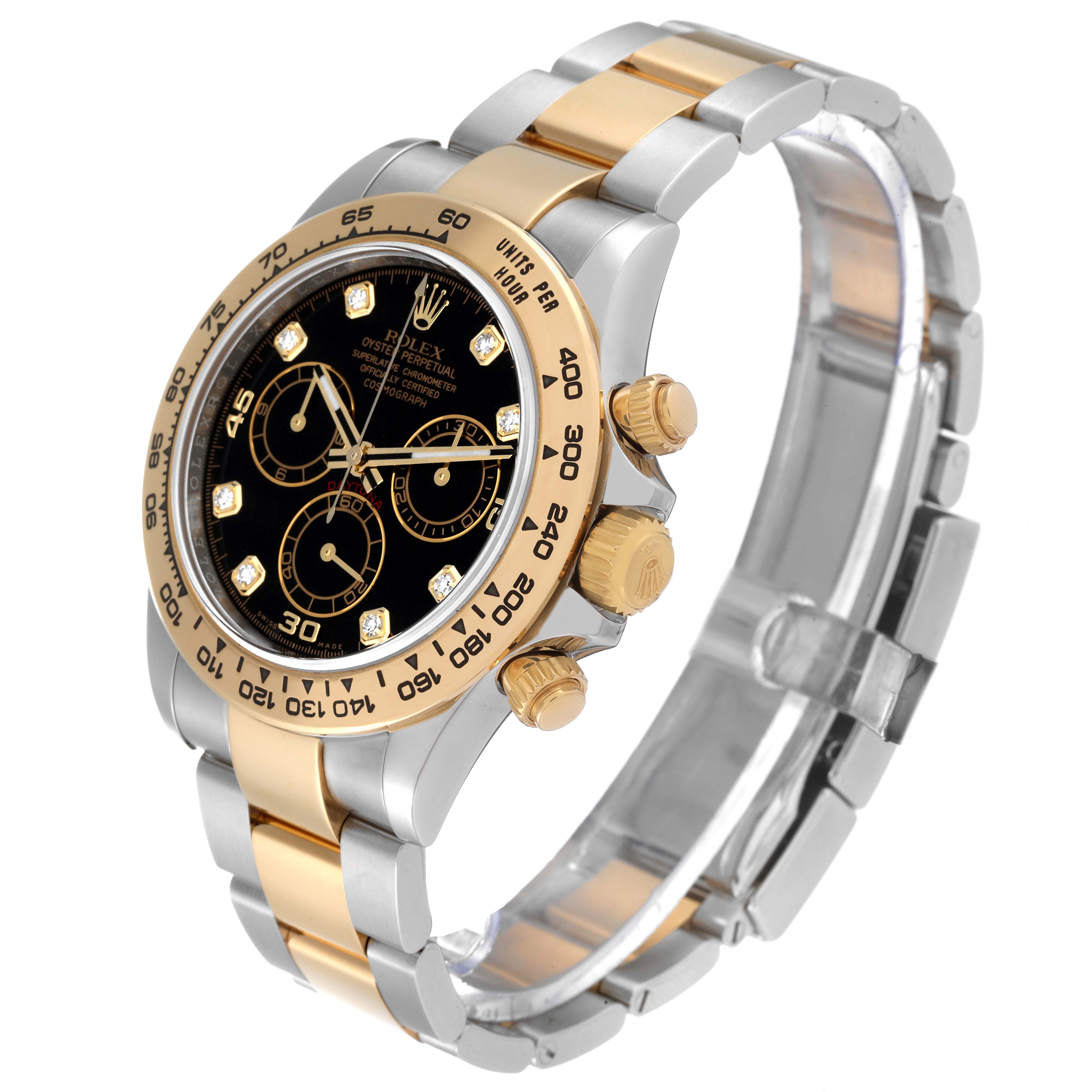 The Rolex Daytona 116503 Men
s Steel and Gold (two tone) Black Dial 116503 Men
s Steel and Gold (two tone) Black Dial watch is shown at an angled view, displaying its face, bezel, crown, pushers, and bracelet.