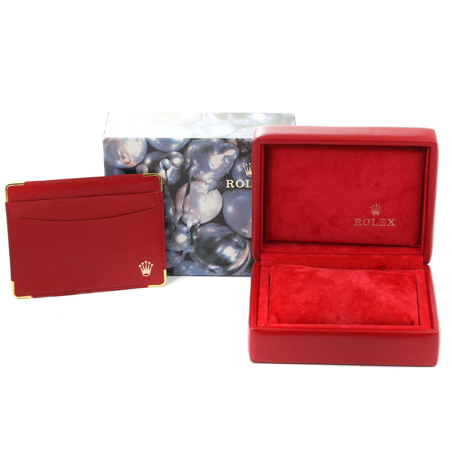 This image shows a Rolex Datejust 69173 Women's Steel and Gold (two tone) Champagne Dial 69173 Women's Steel and Gold (two tone) Champagne Dial watch box, a red cardholder, and an outer decorative box.