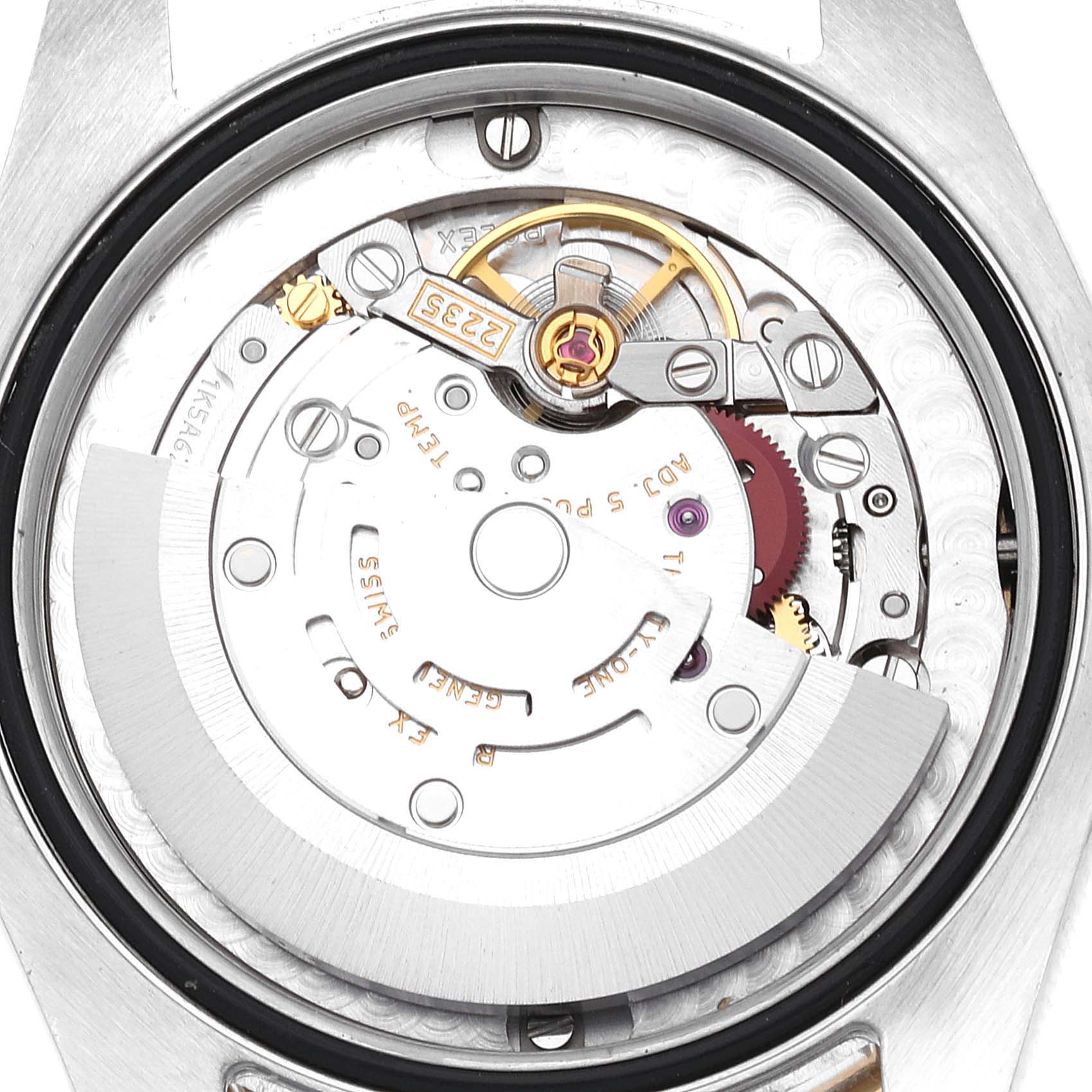 The image shows the intricate mechanical movement of a Rolex Mid-Size 178383 Women
s Steel and Gold (two tone) Champagne Dial 178383 Women
s Steel and Gold (two tone) Champagne Dial model watch from the case back angle.