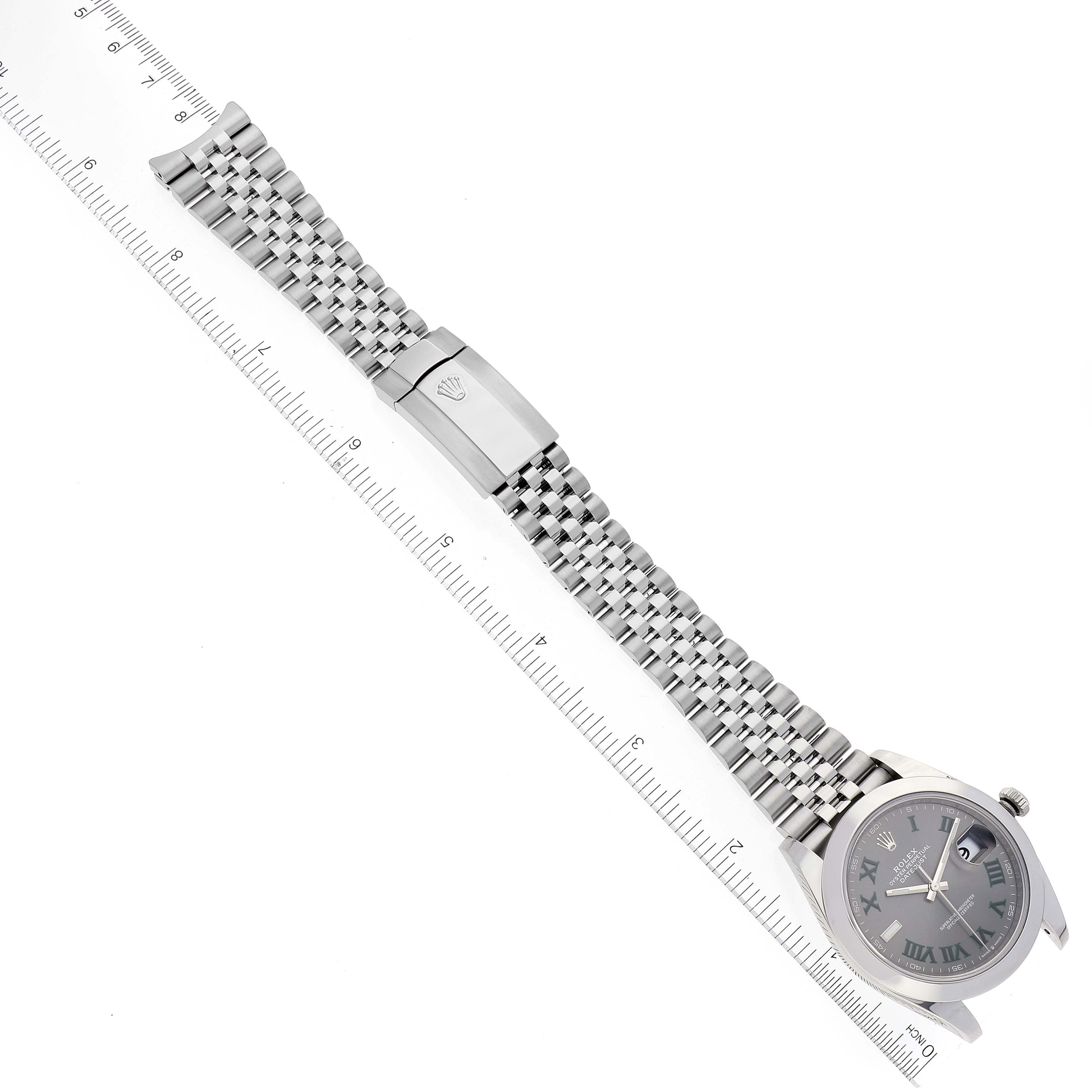 The image shows a Rolex Datejust 41 126300 Men's Stainless Steel Grey Dial 126300 Men's Stainless Steel Grey Dial watch laid flat with its silver bracelet next to a ruler, displaying the full length.