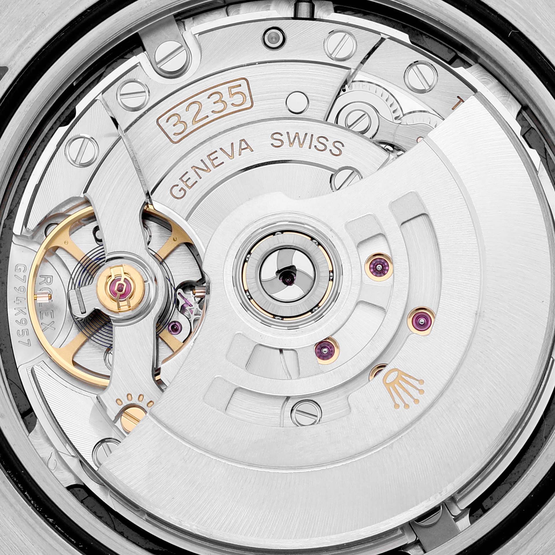 The image shows the mechanism of a Rolex Datejust 41 126334 Men
s Stainless Steel Black Dial 126334 Men
s Stainless Steel Black Dial watch, focusing on the movement and internal components.