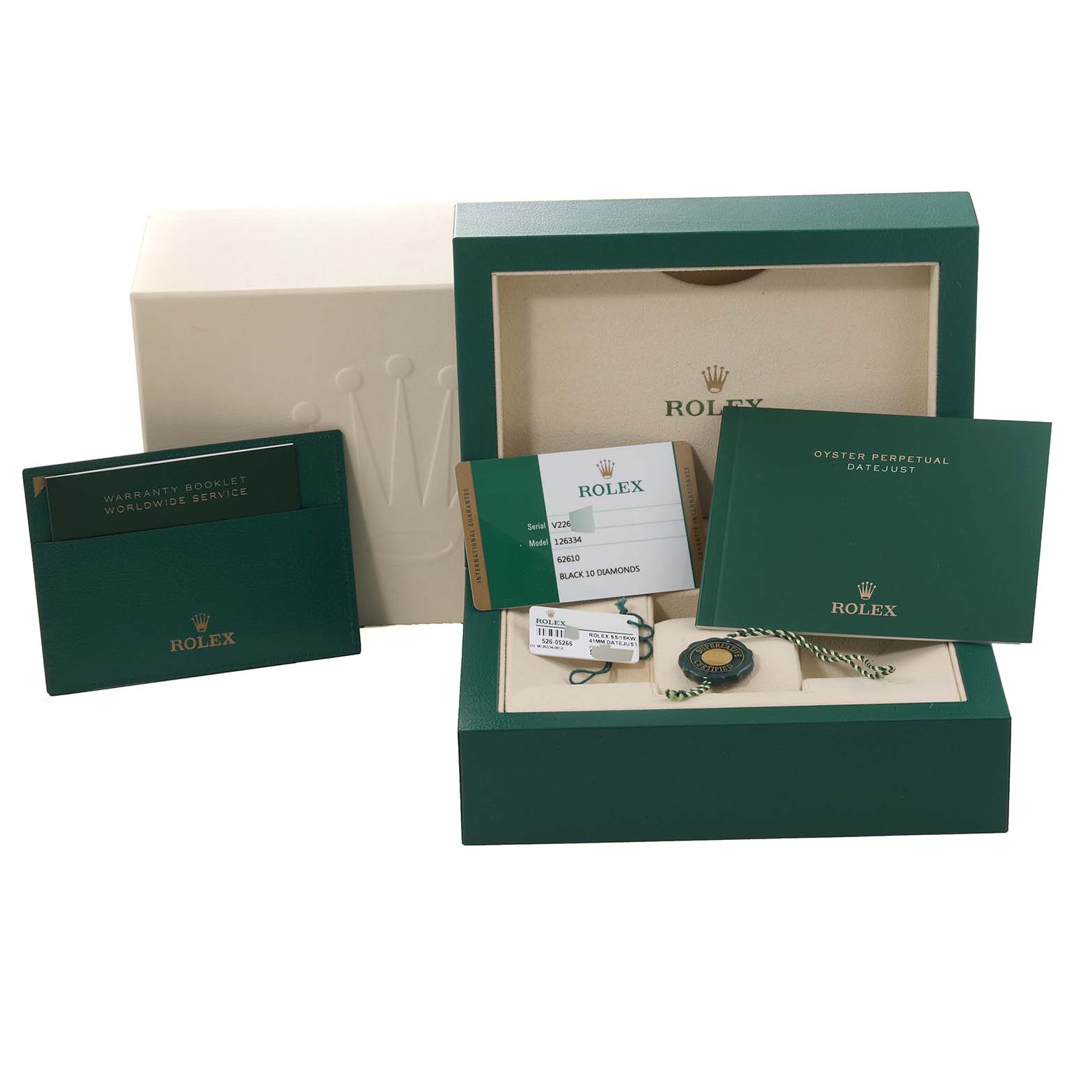 The image shows an open Rolex Datejust 41 126334 Men
s Stainless Steel Black Dial 126334 Men
s Stainless Steel Black Dial box with warranty cards, booklets, and tags at a front angle.