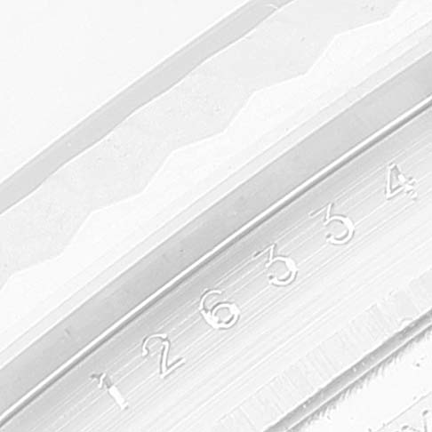 This is a close-up angle of the bezel and the serial number area of a Rolex Datejust 41 126334 Men's Stainless Steel Grey Dial 126334 Men's Stainless Steel Grey Dial watch.