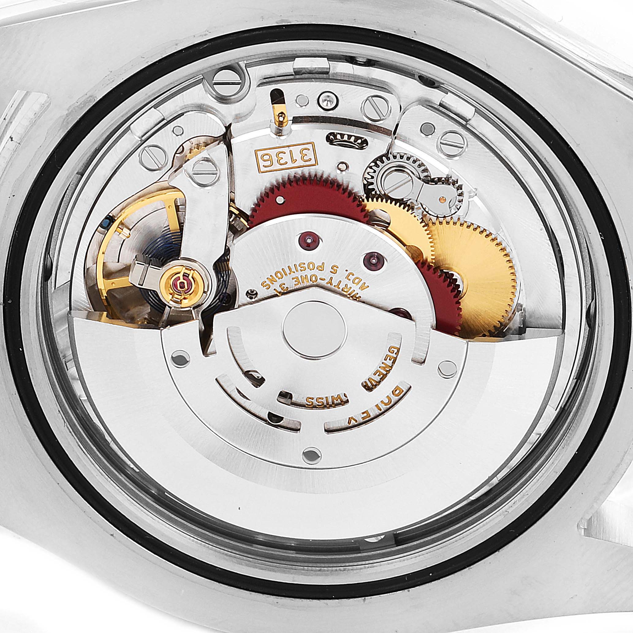 The image shows the intricate internal movement mechanism of the Rolex Datejust 41 116334 Men
s Stainless Steel Black Dial 116334 Men
s Stainless Steel Black Dial model from a rear angle.