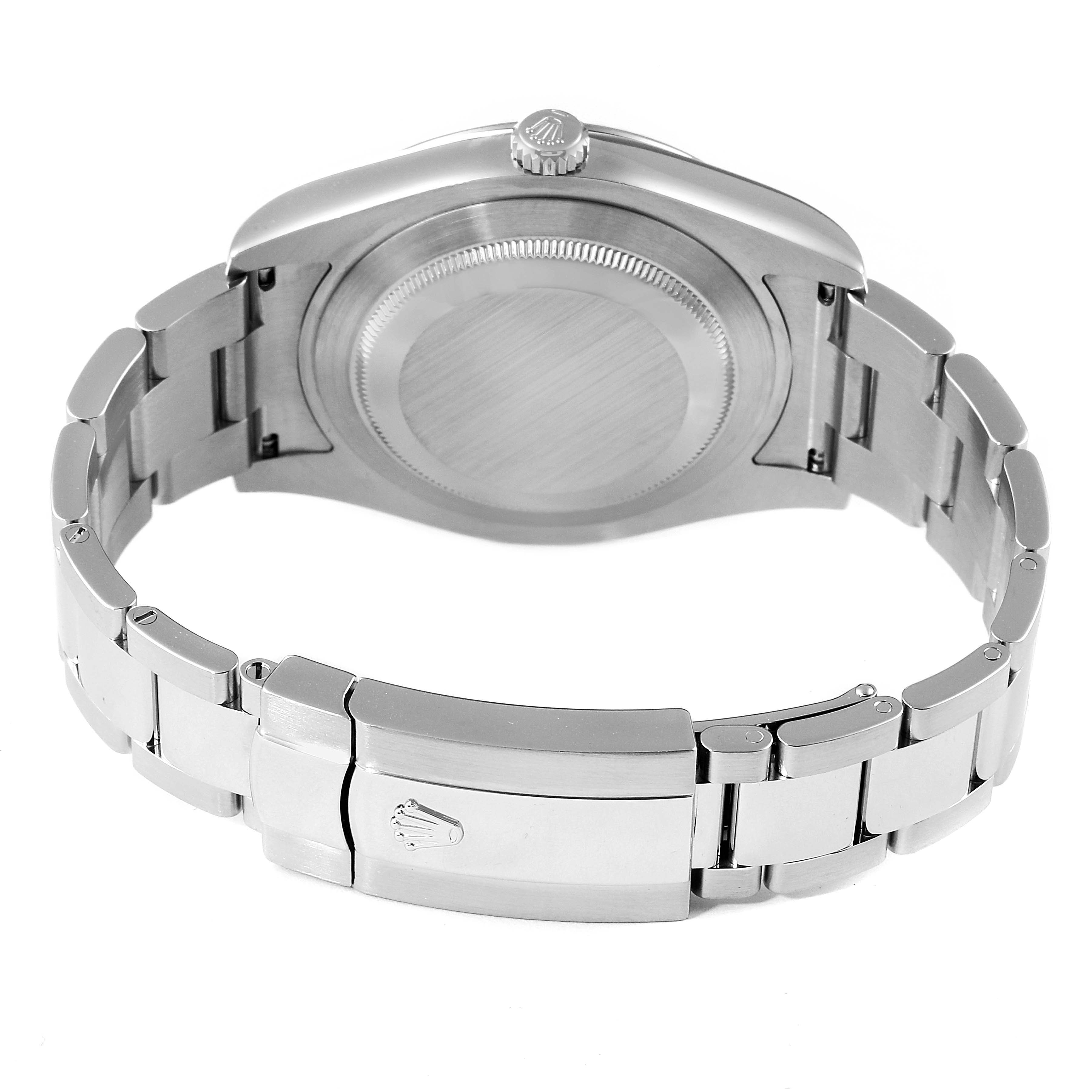 The image shows the back case and bracelet of a Rolex Datejust 41 116334 Men
s Stainless Steel Black Dial 116334 Men
s Stainless Steel Black Dial, with a focus on its clasp and crown.