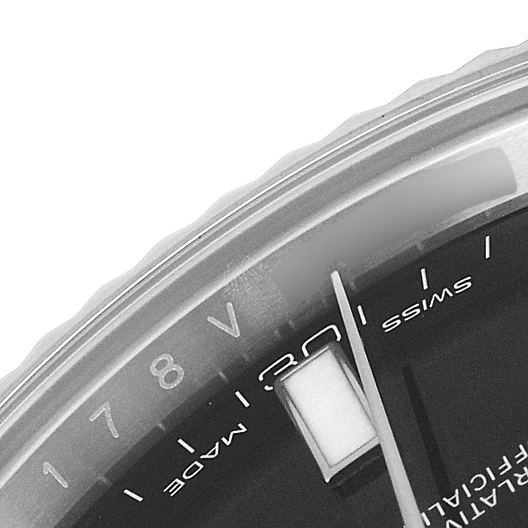 This image shows a close-up of the Datejust 41 Rolex watch face, highlighting part of the dial, date indicator, and minute markers.