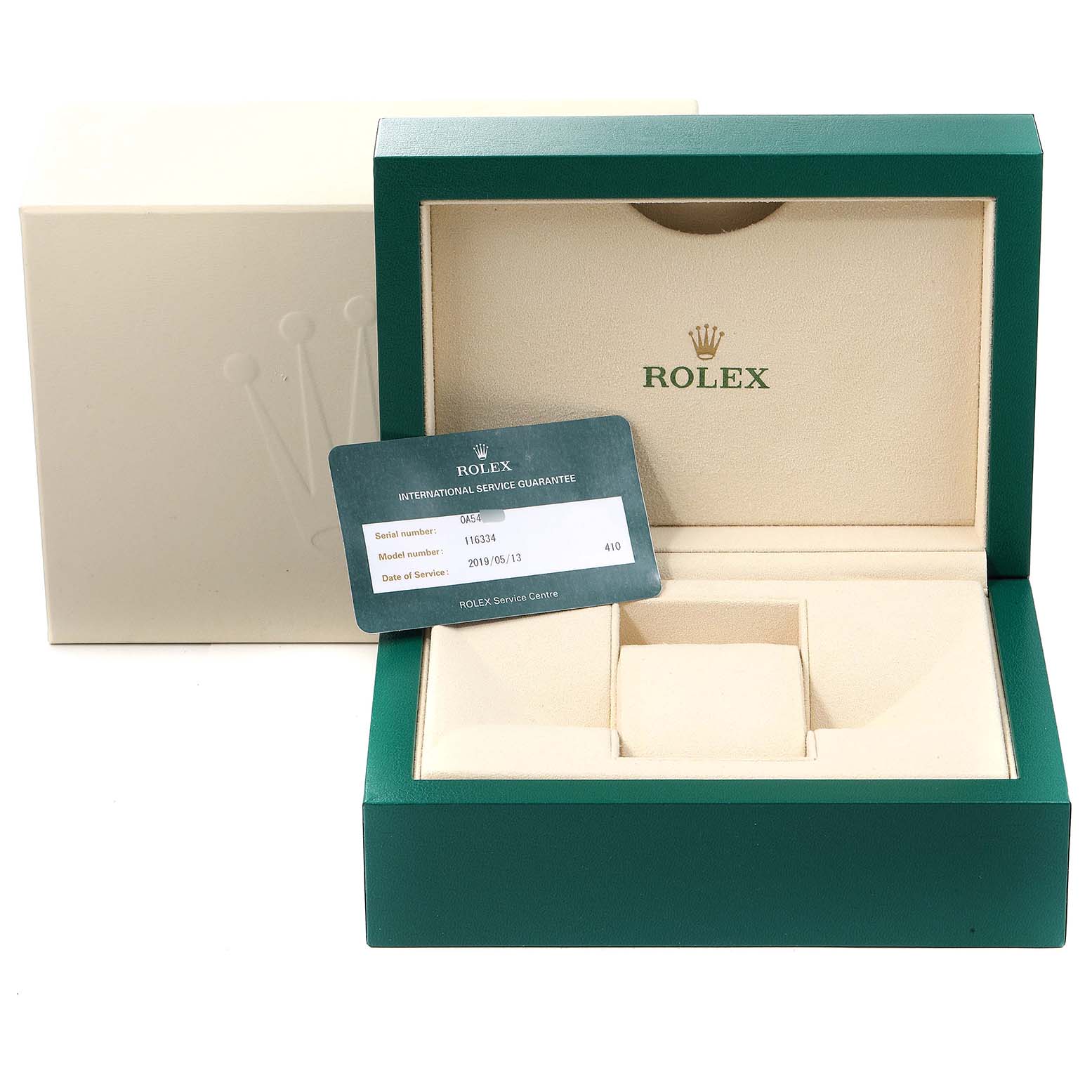 The image shows an opened Rolex Datejust 41 116334 Men
s Stainless Steel Black Dial 116334 Men
s Stainless Steel Black Dial watch box with an International Service Guarantee card.