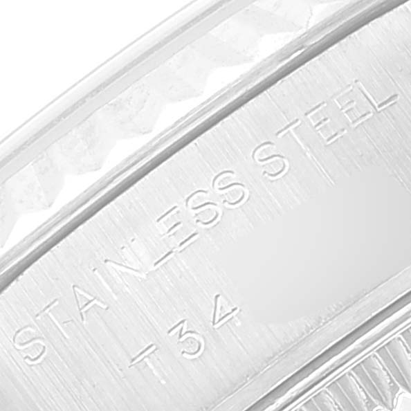 This close-up image of the Rolex Datejust 69174 Women's Stainless Steel Pink Dial 69174 Women's Stainless Steel Pink Dial watch shows the stainless steel text on the back side of the case.