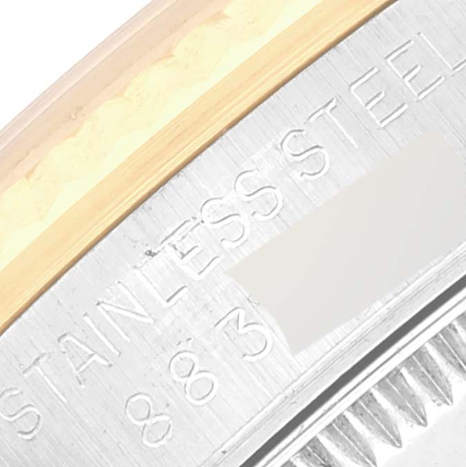 Close-up angle showing the "Stainless Steel" engraving on the back case of a Rolex Mid-Size 68273 Women's Steel and Gold (two tone) Champagne Dial 68273 Women's Steel and Gold (two tone) Champagne Dial model watch.