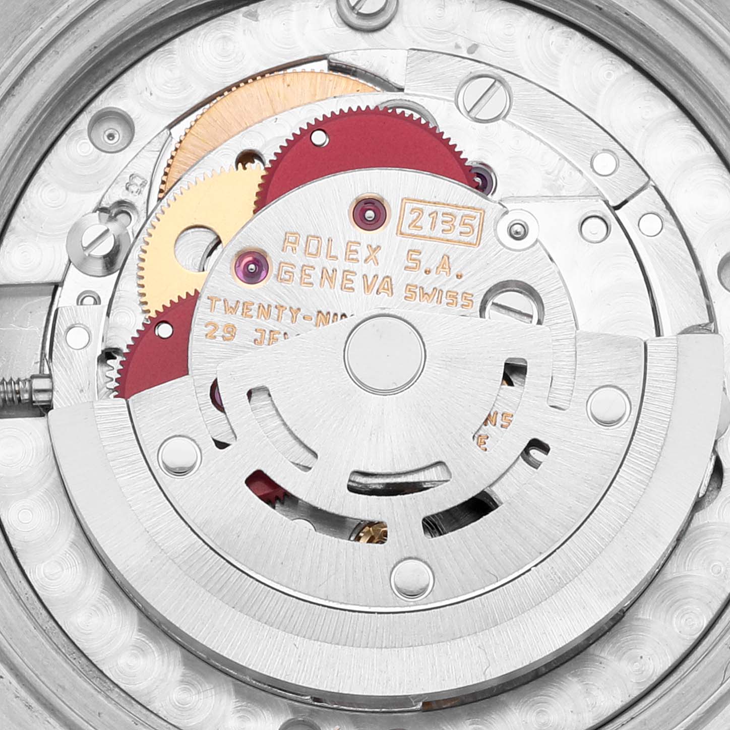 This close-up view shows the inner movement mechanism of a Mid-Size Rolex watch, including gears and the rotor.