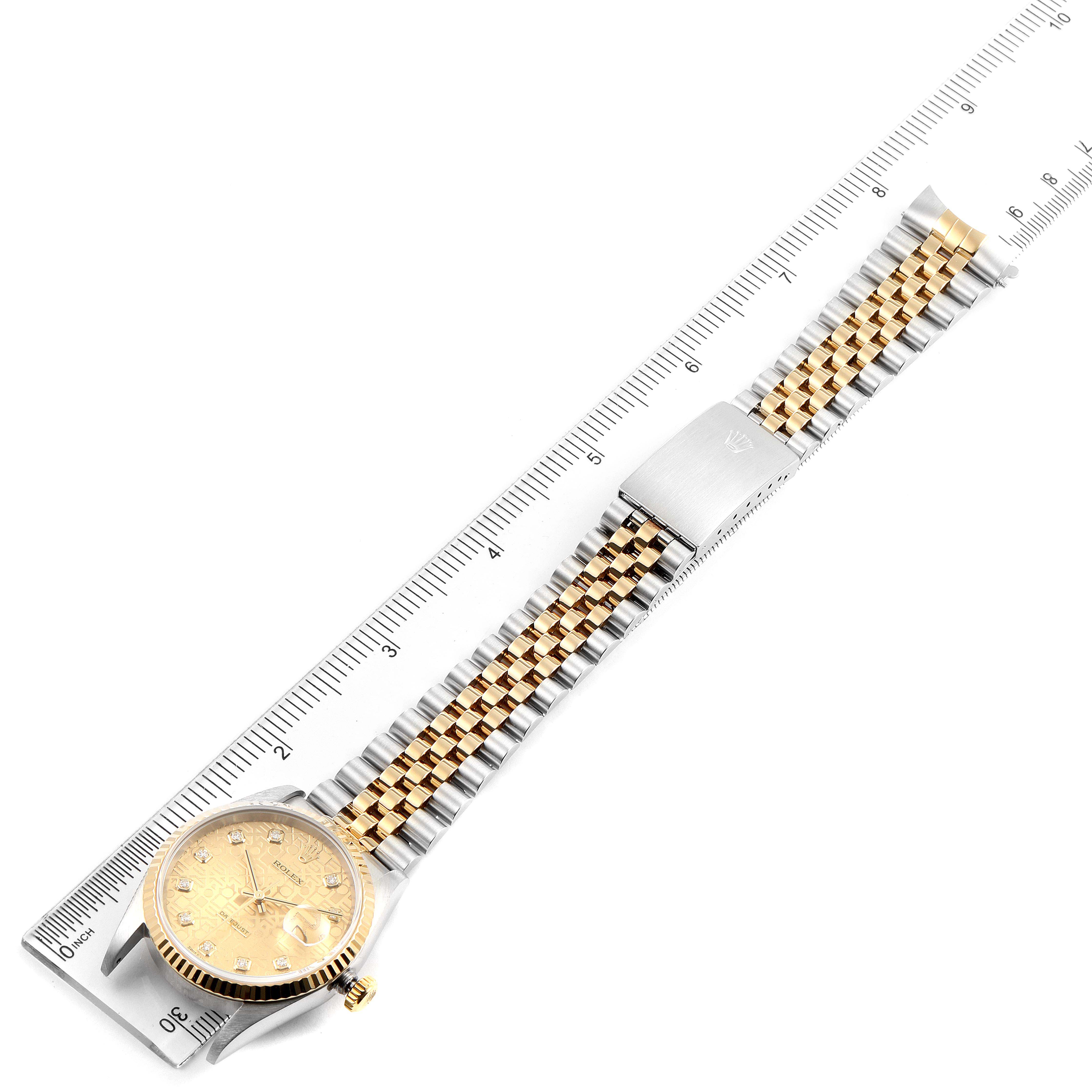 The Rolex Datejust 16233 Men's Steel and Gold (two tone) Champagne Dial 16233 Men's Steel and Gold (two tone) Champagne Dial watch is displayed flat with a close-up view of its face, band, and clasp, alongside a ruler for scale.