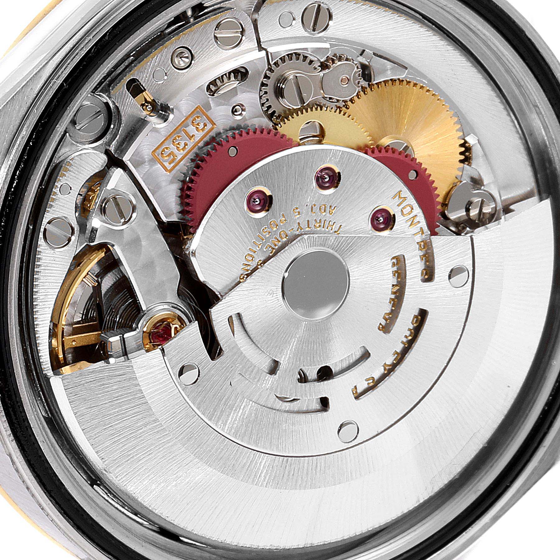 This image shows a close-up of the movement mechanism inside a Rolex Datejust 16233 Men's Steel and Gold (two tone) Champagne Dial 16233 Men's Steel and Gold (two tone) Champagne Dial watch.