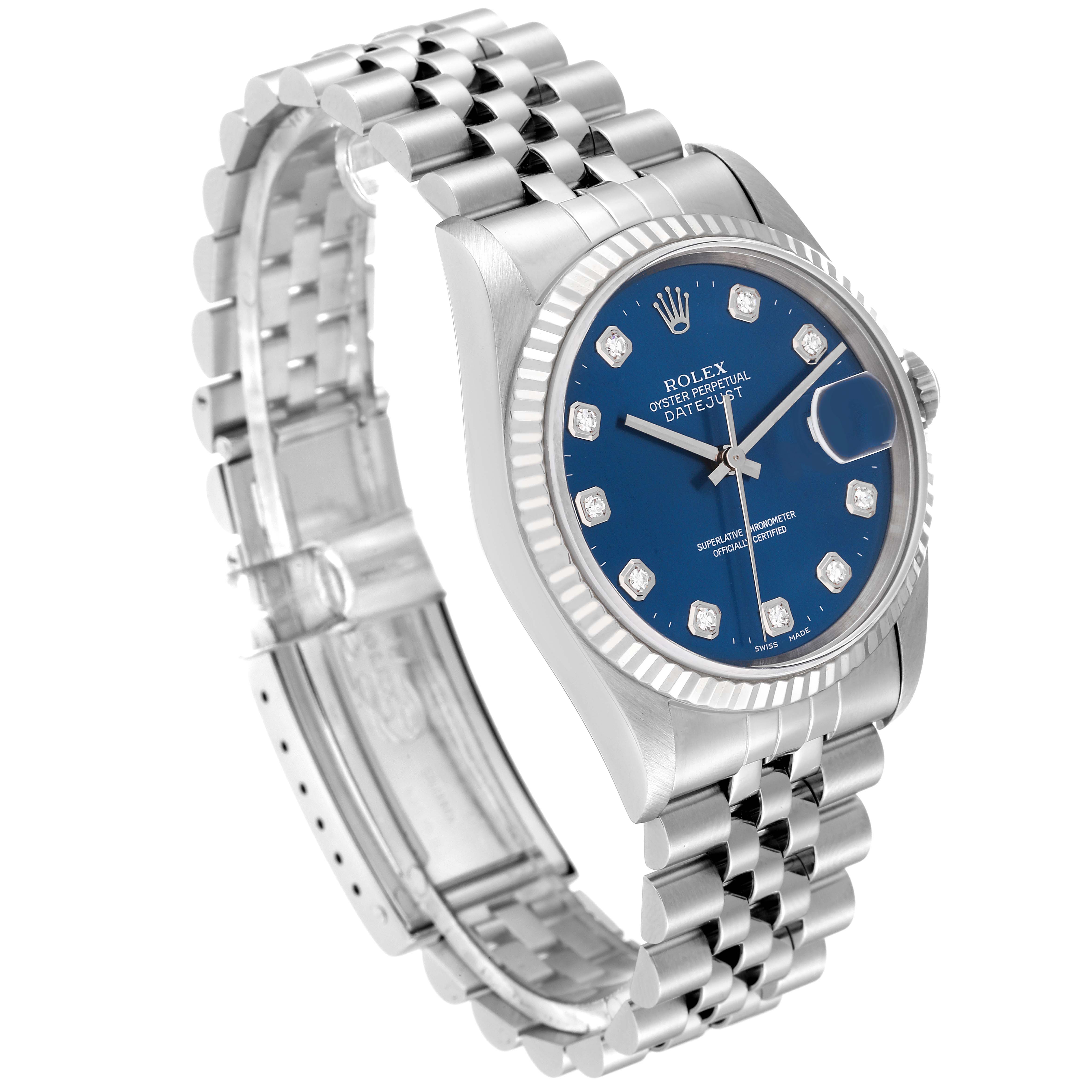 The Rolex Datejust 16234 Men's Stainless Steel Blue Dial 16234 Men's Stainless Steel Blue Dial watch is shown at a three-quarter angle, highlighting its blue dial, jubilee bracelet, and fluted bezel.