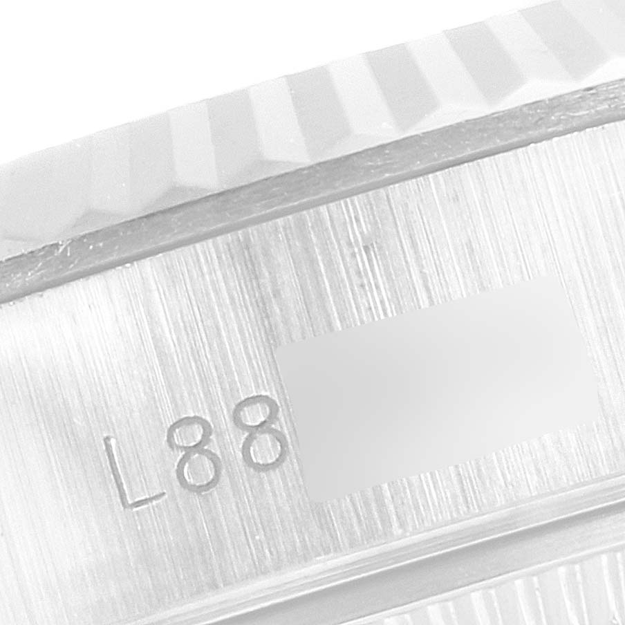 The image shows a close-up of the case side of the Rolex Datejust 69174 Women's Stainless Steel Silver Dial 69174 Women's Stainless Steel Silver Dial watch, specifically displaying the model number engraving.