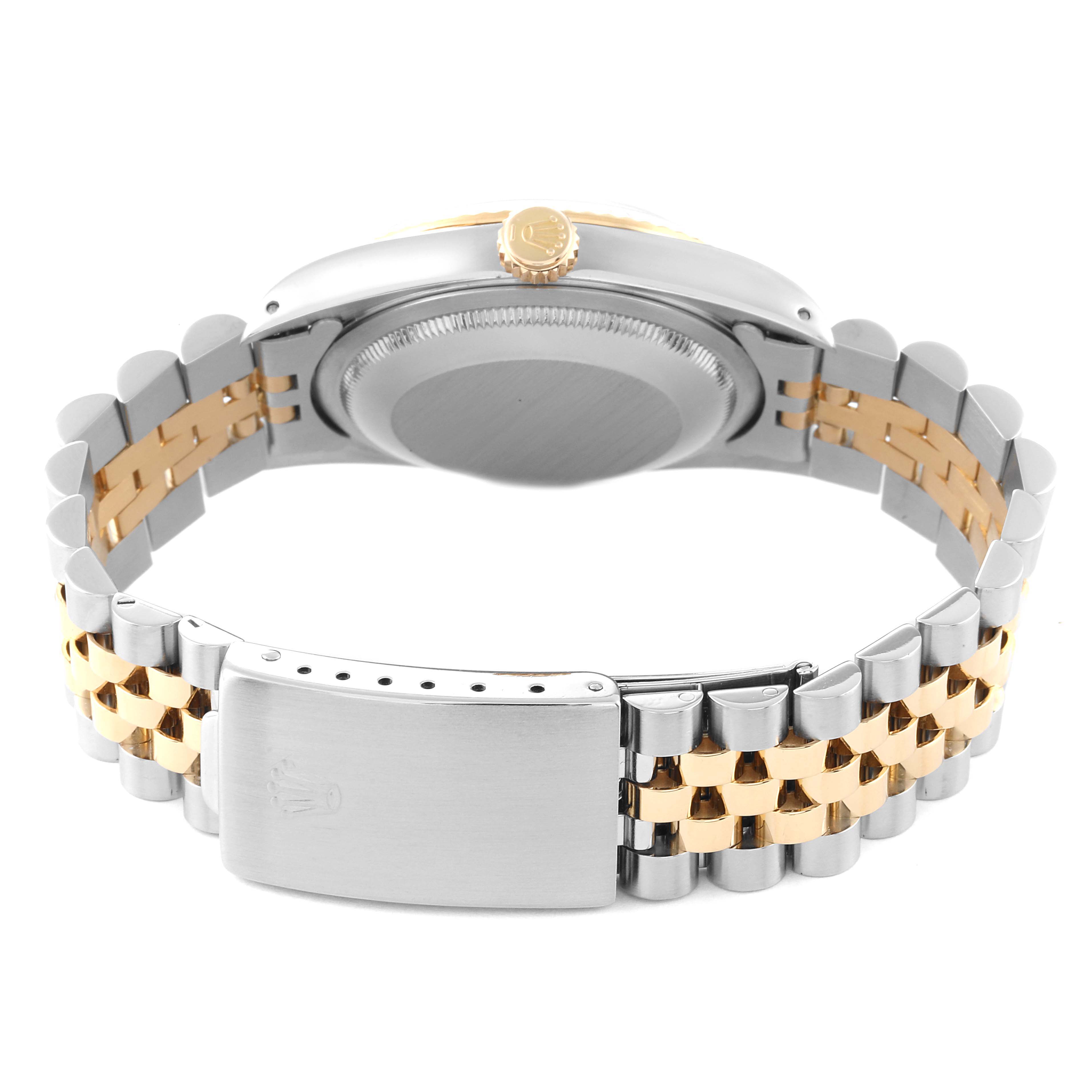 This image shows the back view of a Rolex Datejust 16233 Men's Steel and Gold (two tone) Black Dial 16233 Men's Steel and Gold (two tone) Black Dial watch, displaying the case back and two-tone bracelet with the clasp.