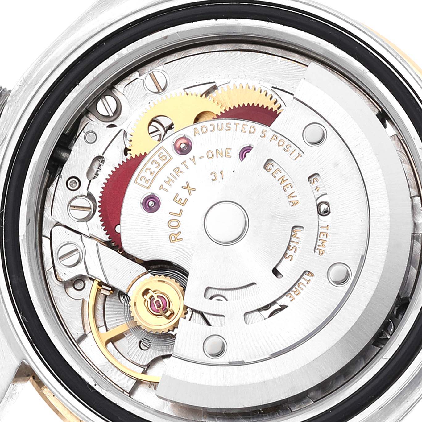 The image shows the inner mechanism of the Rolex Datejust 279163 Women's Steel and Gold (two tone) Silver Dial 279163 Women's Steel and Gold (two tone) Silver Dial watch, highlighting the gears and automatic movement components.