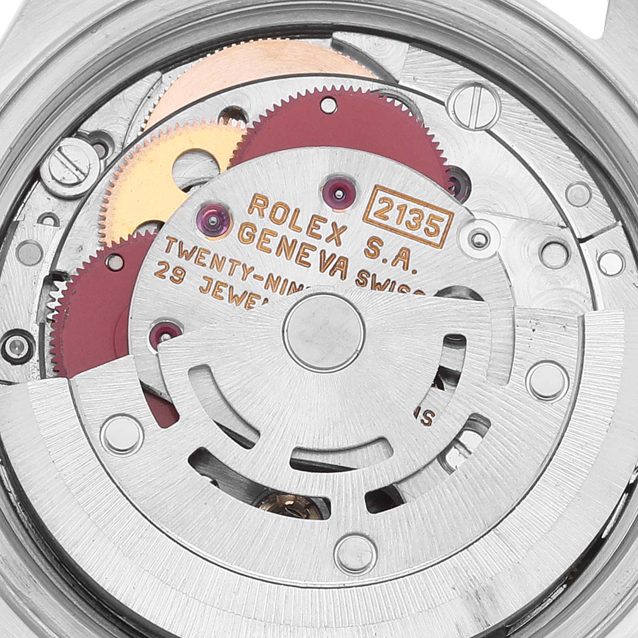 This image shows the inner mechanical movement of a Rolex Datejust 69173 Women's Stainless Steel Champagne Dial 69173 Women's Stainless Steel Champagne Dial watch, specifically the caliber marked "ROLEX S.A. GENEVA SWISS 2135".