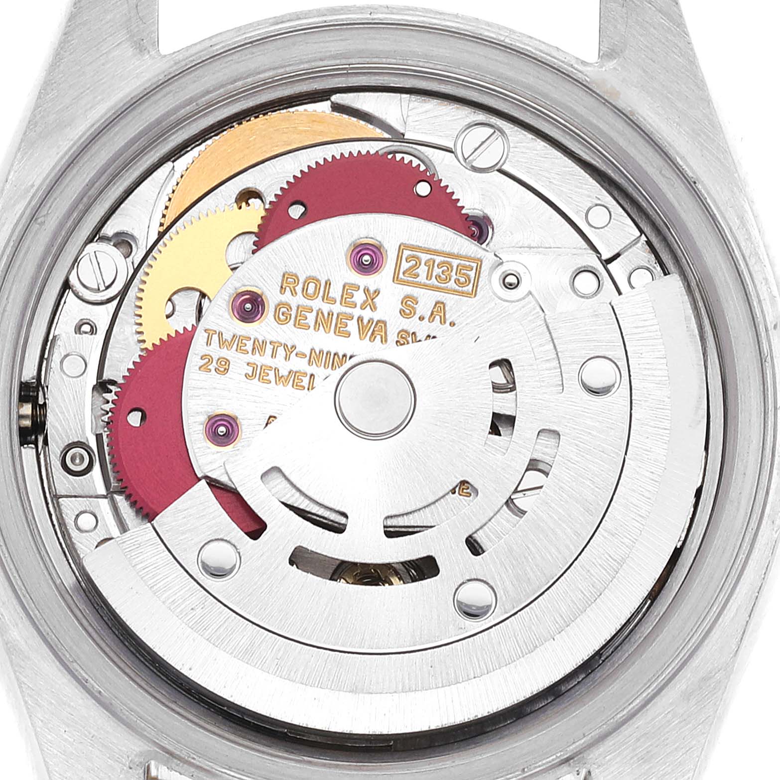 This image shows the movement mechanism of a Rolex Datejust 69173 Women's Steel and Gold (two tone) Champagne Dial 69173 Women's Steel and Gold (two tone) Champagne Dial watch from a rear angle, revealing its intricate internal gears.