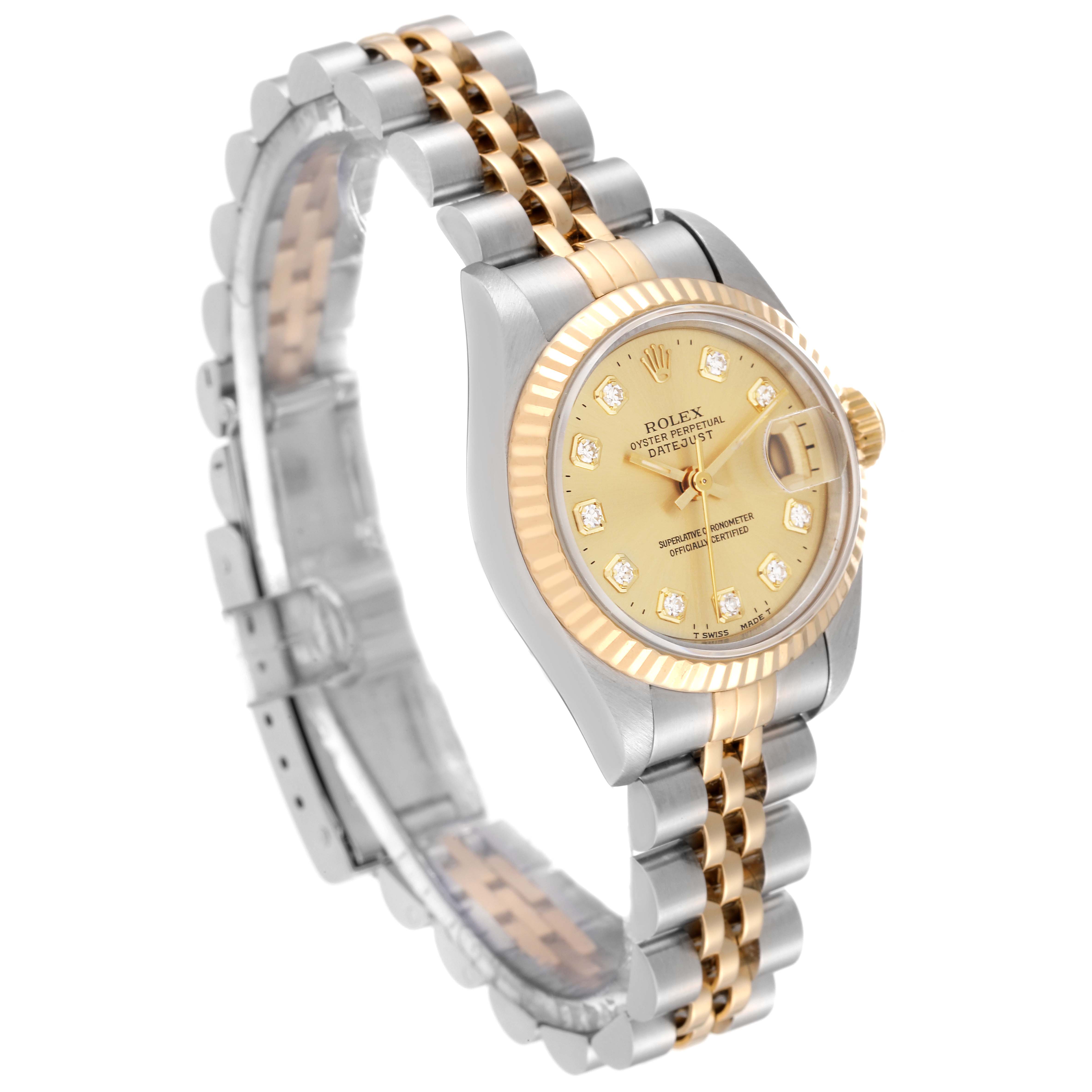 This Rolex Datejust 69173 Women's Steel and Gold (two tone) Champagne Dial 69173 Women's Steel and Gold (two tone) Champagne Dial watch is shown at a slight angle, highlighting its gold and silver bracelet, fluted bezel, and diamond-accented dial.