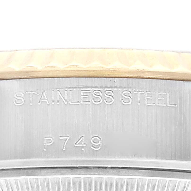 This close-up image shows the stainless steel case and part of the bezel of a Rolex Datejust 79173 Women's Steel and Gold (two tone) Champagne Dial 79173 Women's Steel and Gold (two tone) Champagne Dial watch.