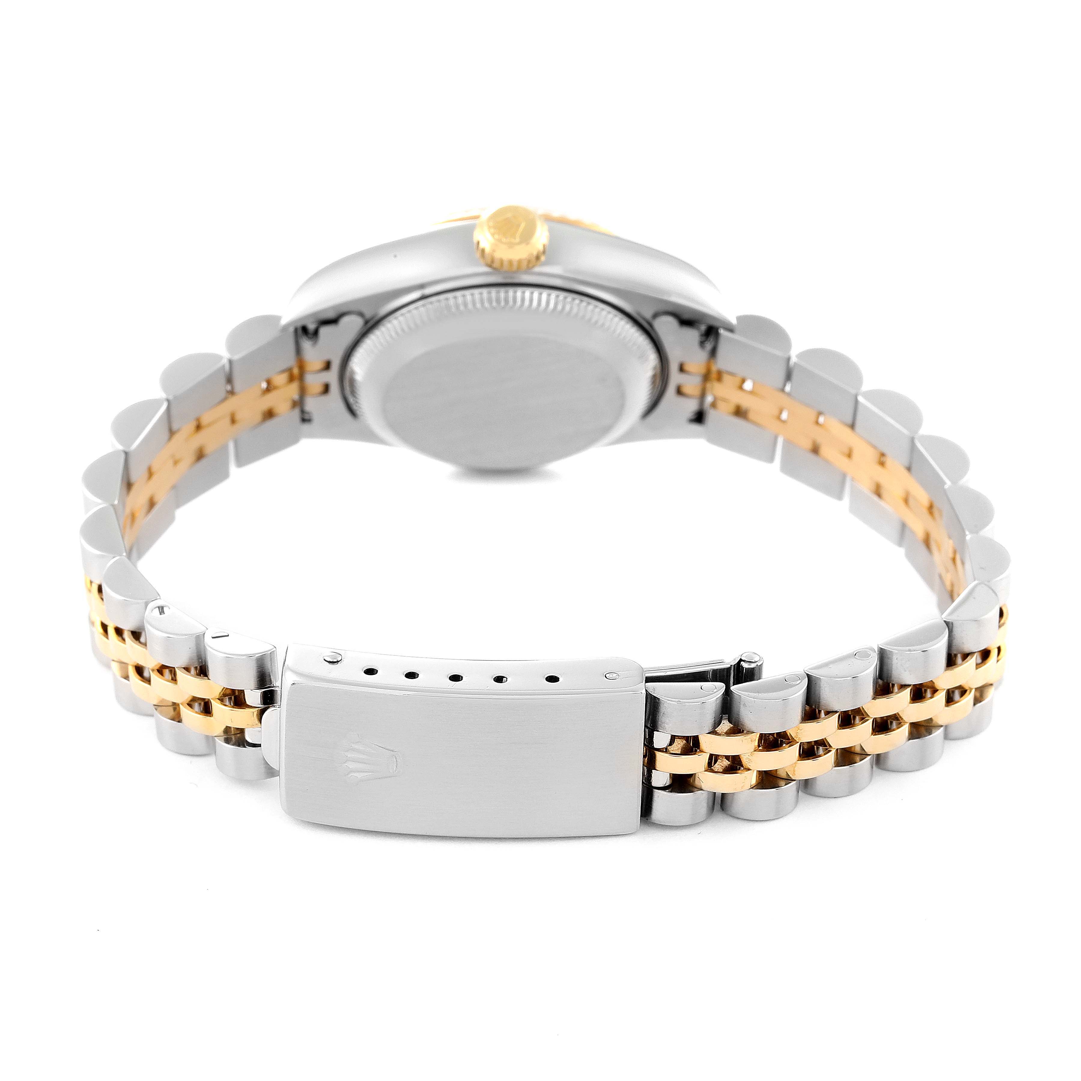 The image shows the backside of a Rolex Datejust 79173 Women's Steel and Gold (two tone) Champagne Dial 79173 Women's Steel and Gold (two tone) Champagne Dial watch, highlighting the clasp and two-tone bracelet.