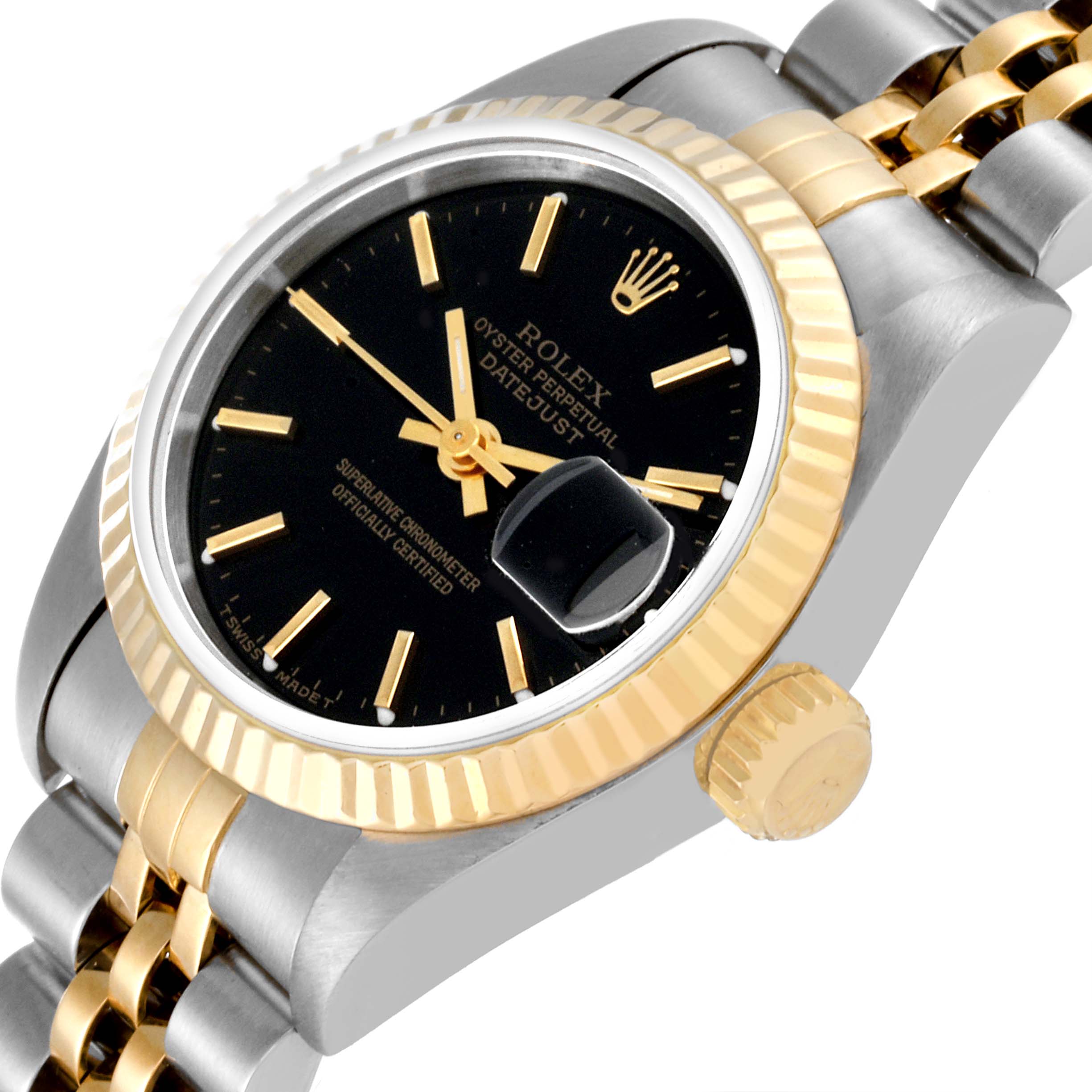 The image shows a close-up angled view of a Rolex Datejust 69173 Women's Steel and Gold (two tone) Black Dial 69173 Women's Steel and Gold (two tone) Black Dial, highlighting the black dial, fluted bezel, date window, and two-tone bracelet.