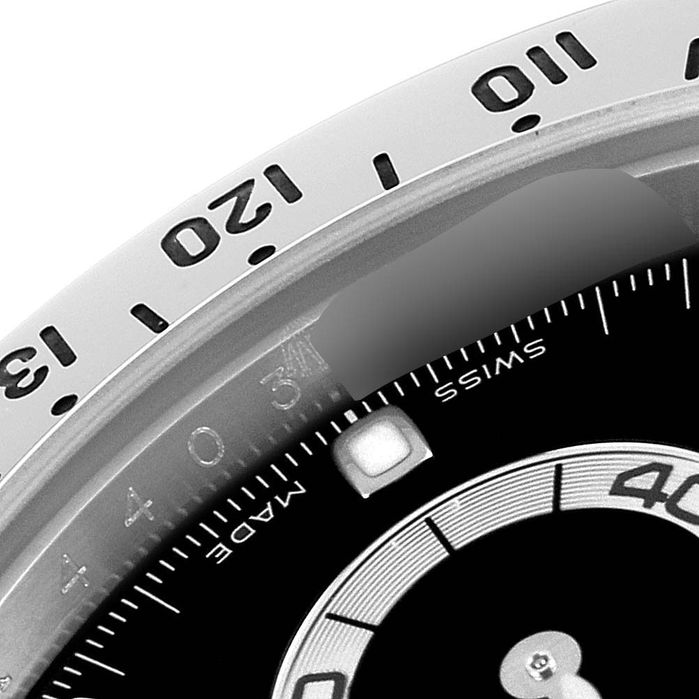 This image shows a close-up of the numbers and edge of the dial on a Rolex Daytona 116520 Men's Stainless Steel Black Dial 116520 Men's Stainless Steel Black Dial watch.