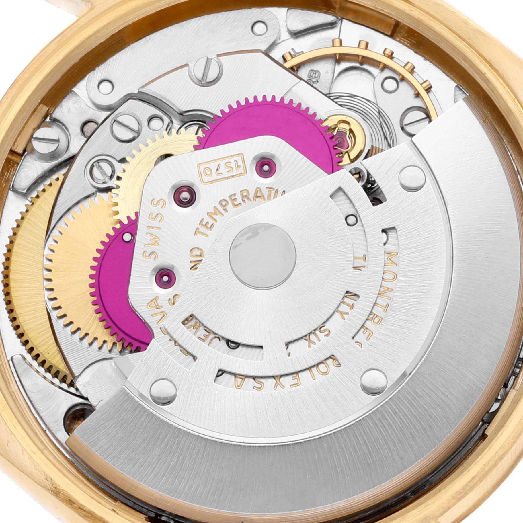 The image shows the intricate internal mechanism of the Rolex Vintage Collection 1005 Men's Yellow Gold Champagne Dial 1005 Men's Yellow Gold Champagne Dial model, viewed from the back case.