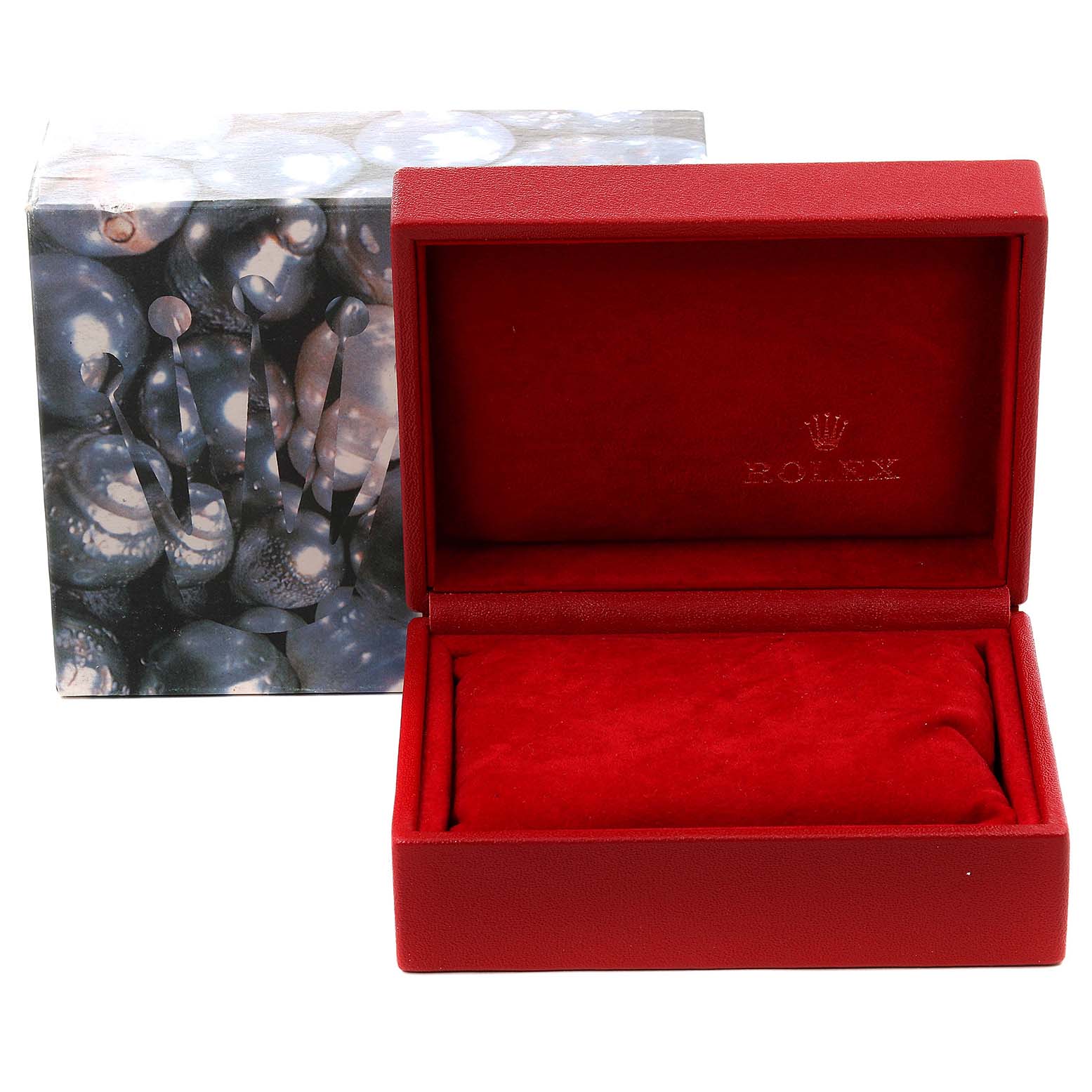 The image shows an open, red Rolex watch box for the President model, with the outer decorative box in the background.