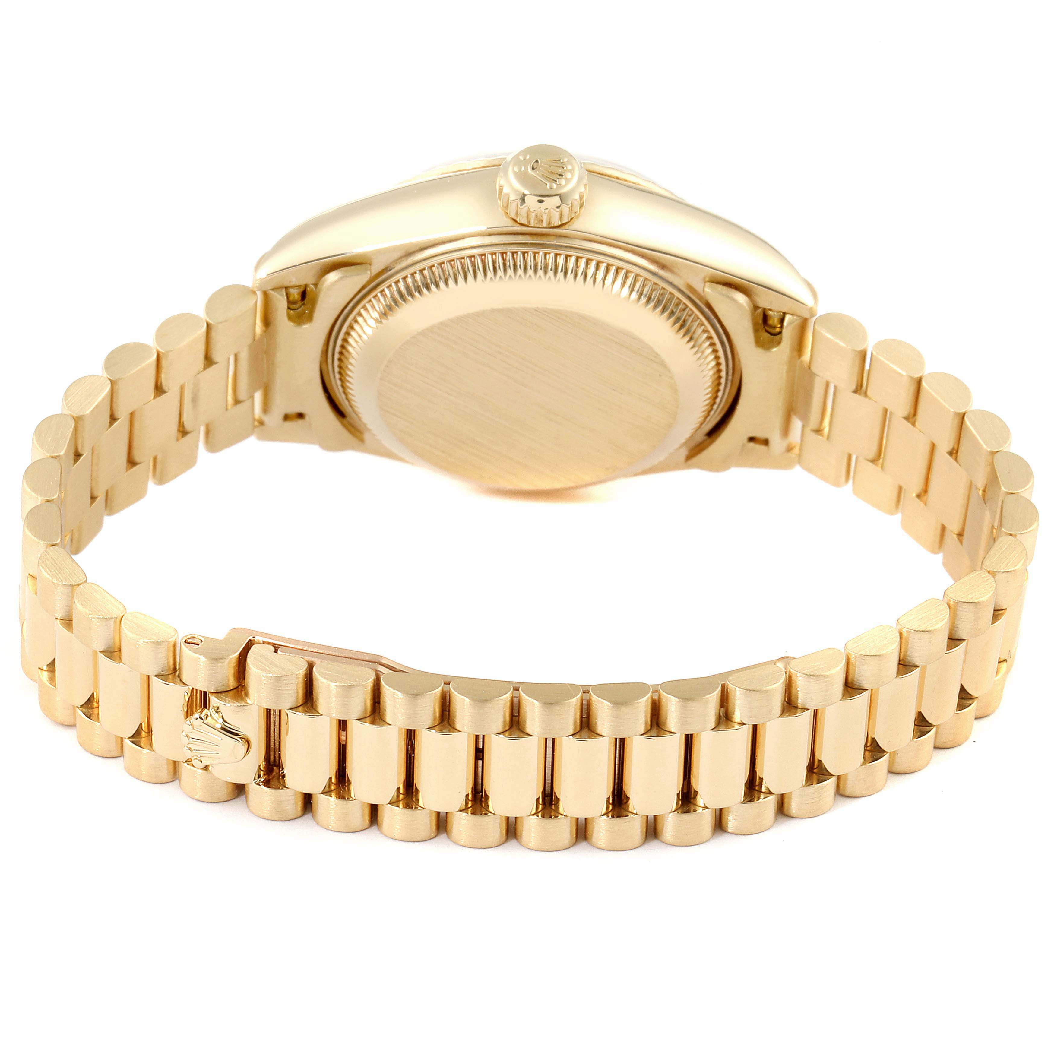 The image shows the back case and bracelet of a Rolex President 79178 Women
s Yellow Gold Mother of Pearl Dial 79178 Women
s Yellow Gold Mother of Pearl Dial model watch from a rear angle.