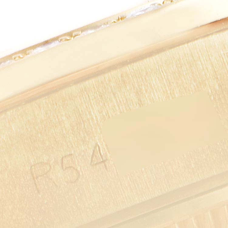 This is a close-up view of the case back and serial number of a Rolex President 69178 Women's Yellow Gold Blue Dial 69178 Women's Yellow Gold Blue Dial model watch.