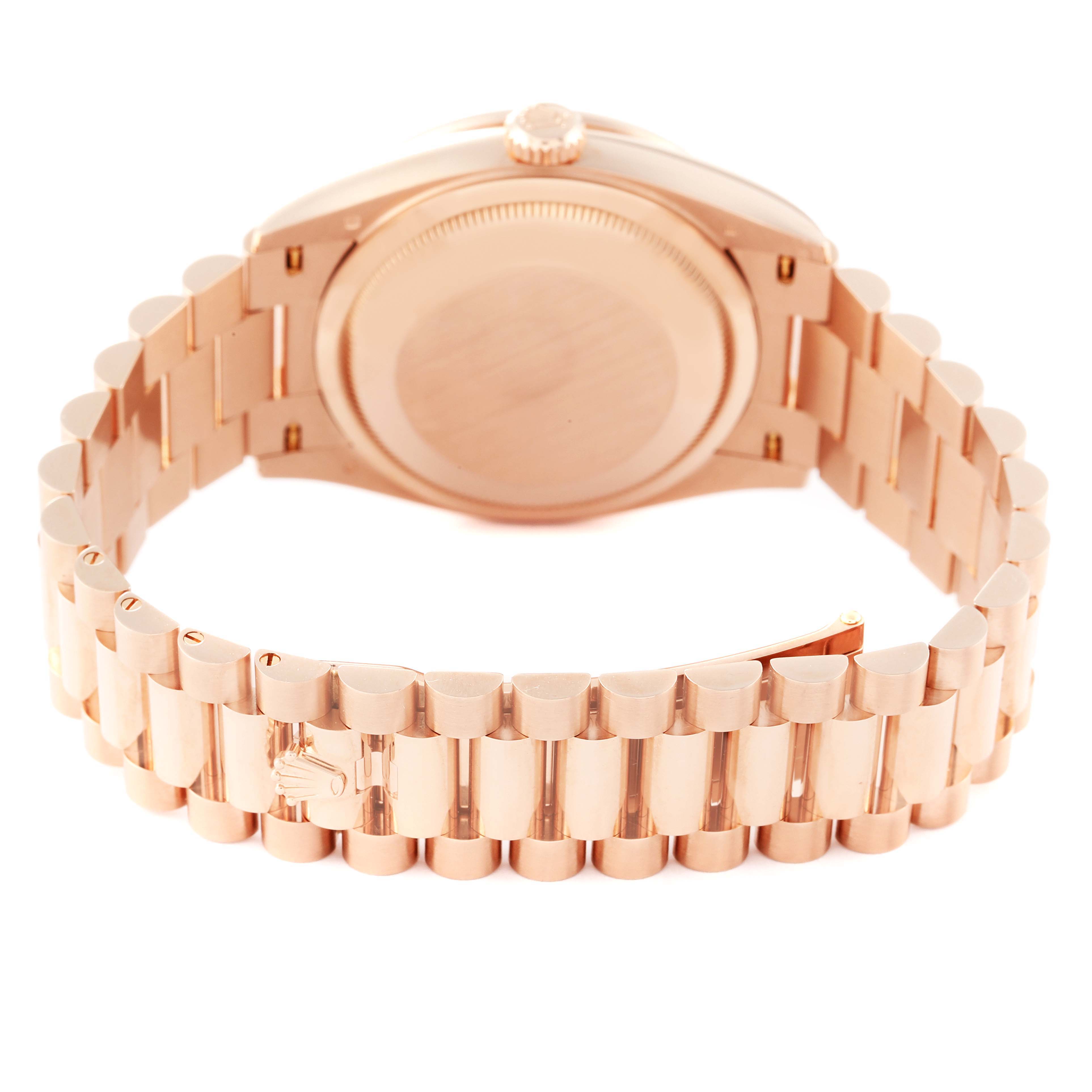 This image shows the back case and bracelet of a Rolex President 128345 Men's Rose Gold Brown Dial 128345 Men's Rose Gold Brown Dial model watch, viewed from the rear.
