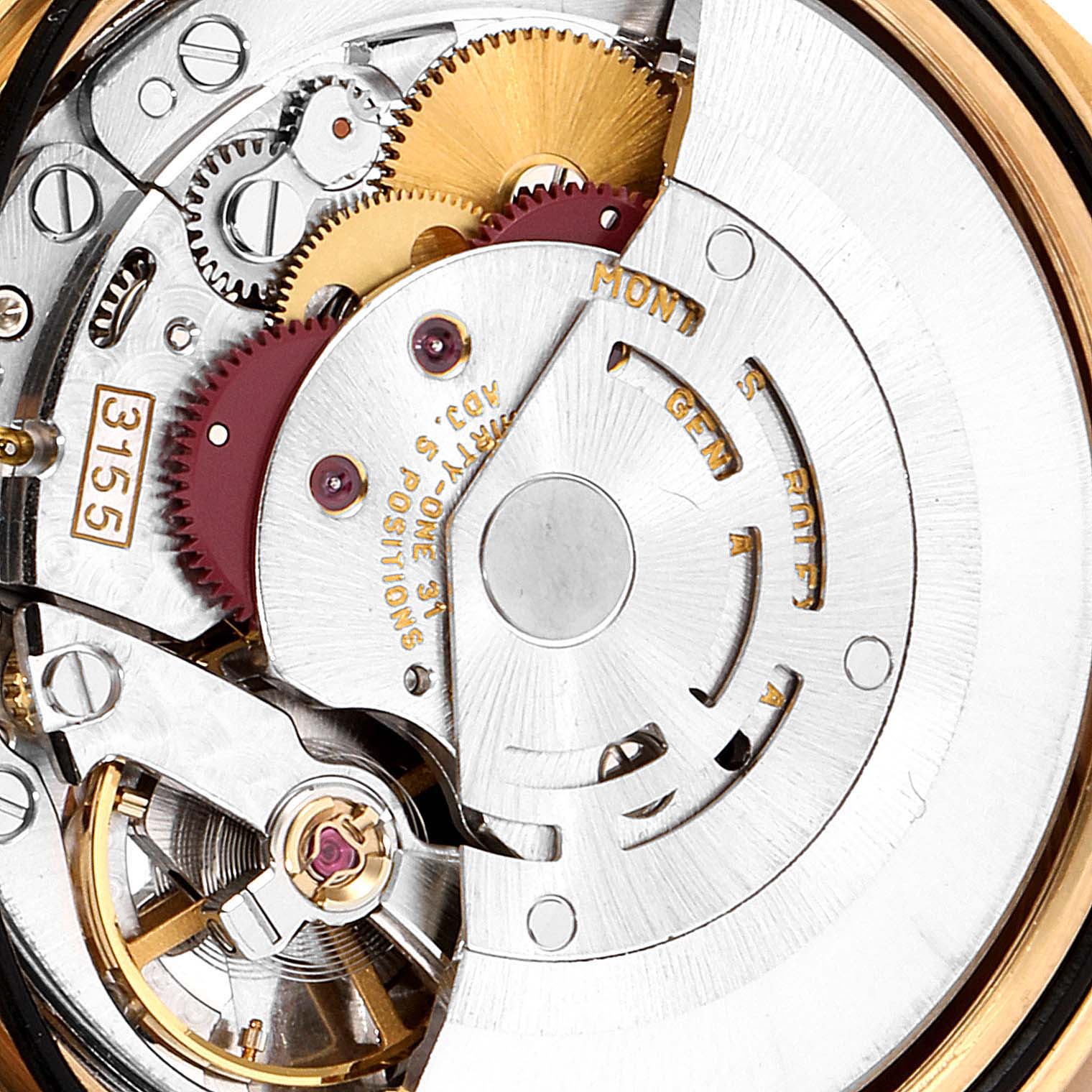 This image shows the intricate internal mechanics of the Rolex President 18348 Men's Yellow Gold Champagne Dial 18348 Men's Yellow Gold Champagne Dial model watch, specifically the gears and movement components.