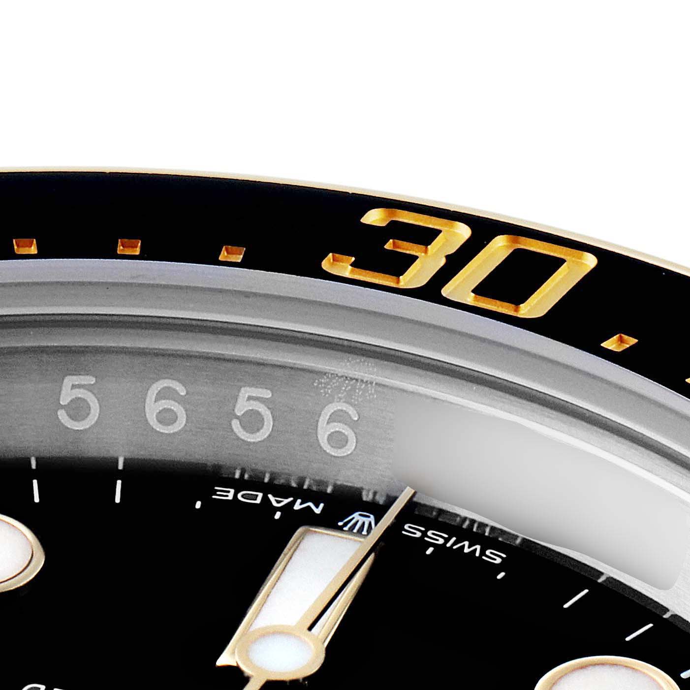 The image shows a close-up of the bezel and dial of a Rolex Sea-Dweller 126603 Men
s Steel and Gold (two tone) Black Dial 126603 Men
s Steel and Gold (two tone) Black Dial watch, featuring its luminescent markers and partial "30" numeral.