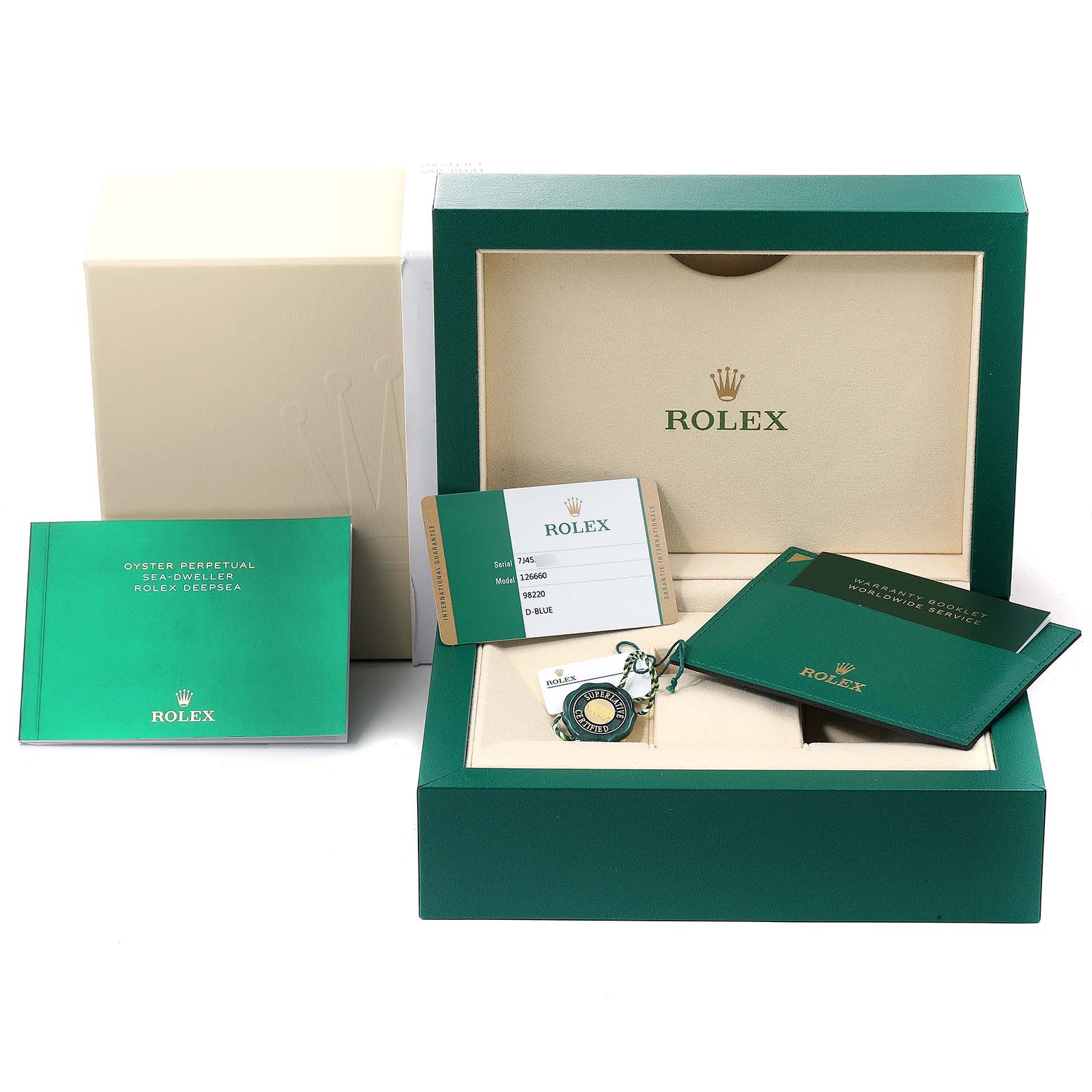 The image shows the packaging set for a Rolex Sea-Dweller 126660 Men
s Stainless Steel Blue Dial 126660 Men
s Stainless Steel Blue Dial, including the box, warranty card, booklet, and tag.