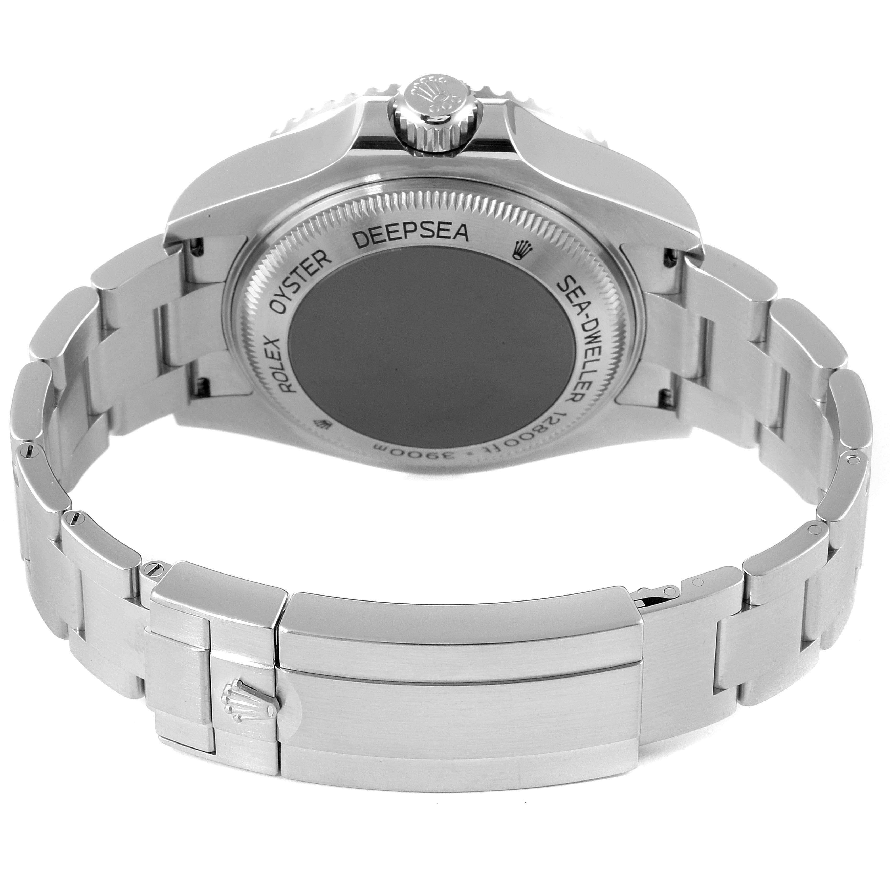 The image shows the back view of a Rolex Sea-Dweller 126660 Men
s Stainless Steel Blue Dial 126660 Men
s Stainless Steel Blue Dial watch, highlighting the case back and metal bracelet.