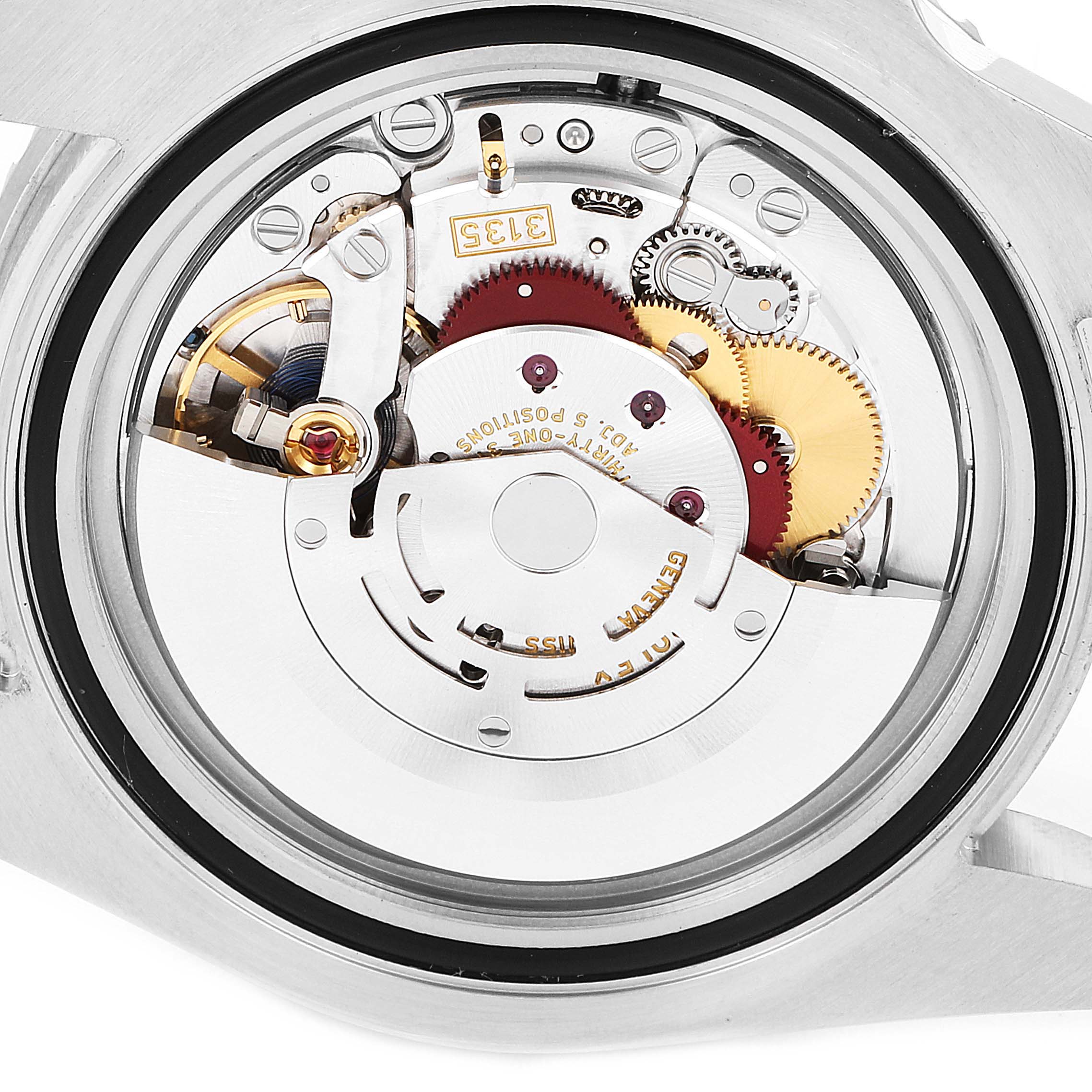 This image shows a close-up view of the movement and internal mechanism of a Rolex Submariner 116610 Men
s Stainless Steel Black Dial 116610 Men
s Stainless Steel Black Dial watch from the back.