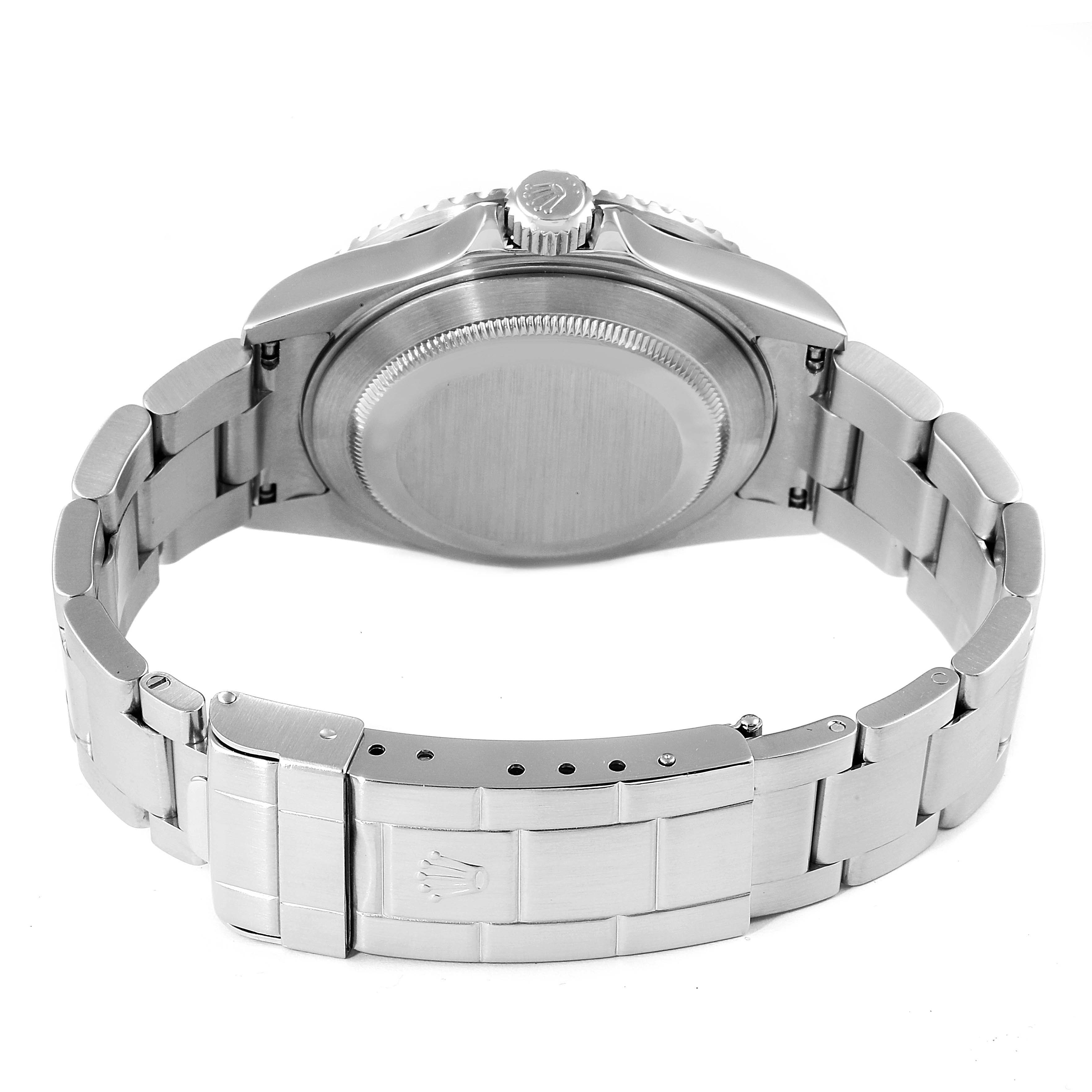 The image shows the back case and bracelet clasp of a Rolex Submariner 16610 Men's Stainless Steel Black Dial 16610 Men's Stainless Steel Black Dial watch from a rear angle.