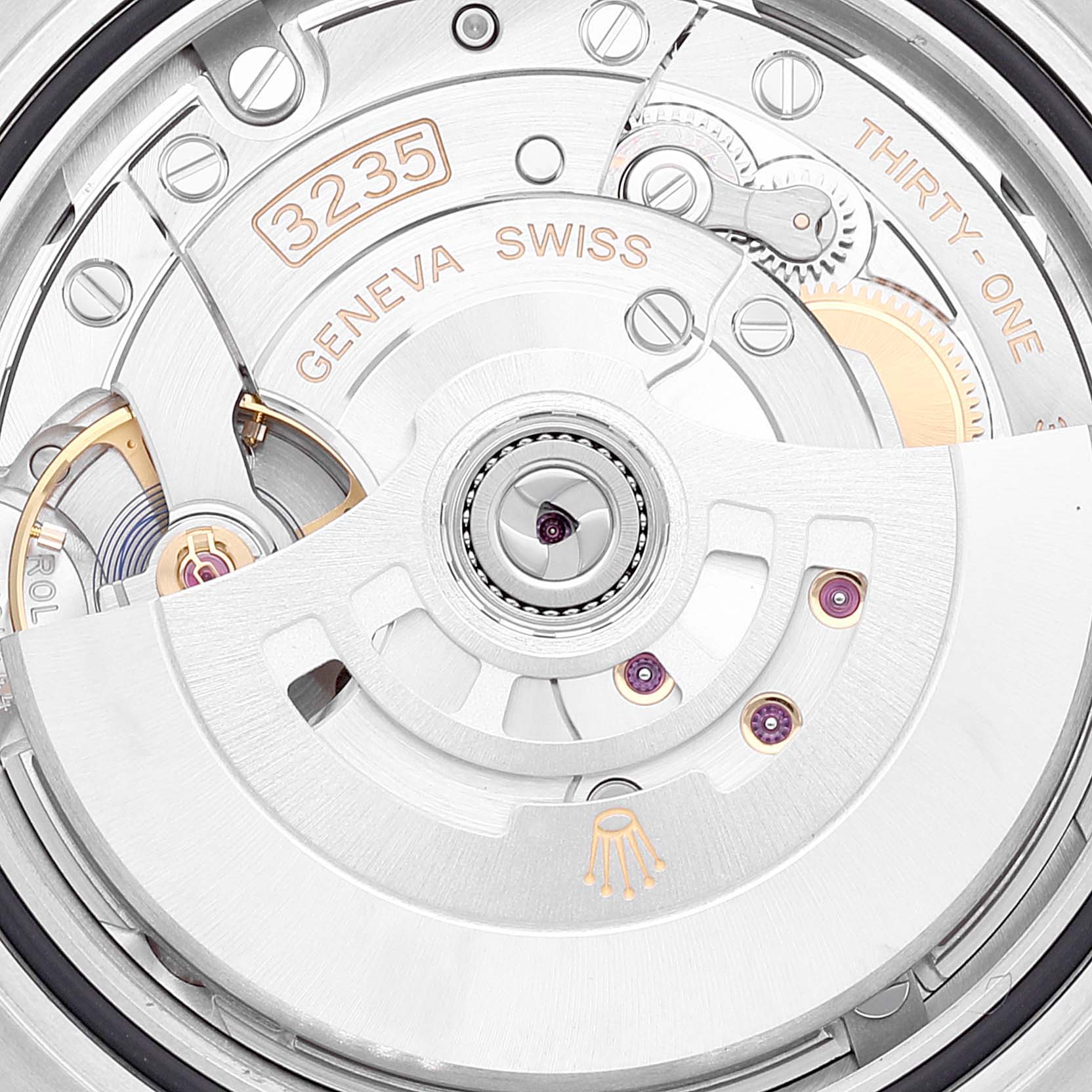 This image shows a close-up view of the Rolex Submariner 126610 Men
s Stainless Steel Black Dial 126610 Men
s Stainless Steel Black Dial
s 3235 movement mechanism, highlighting various intricate components.