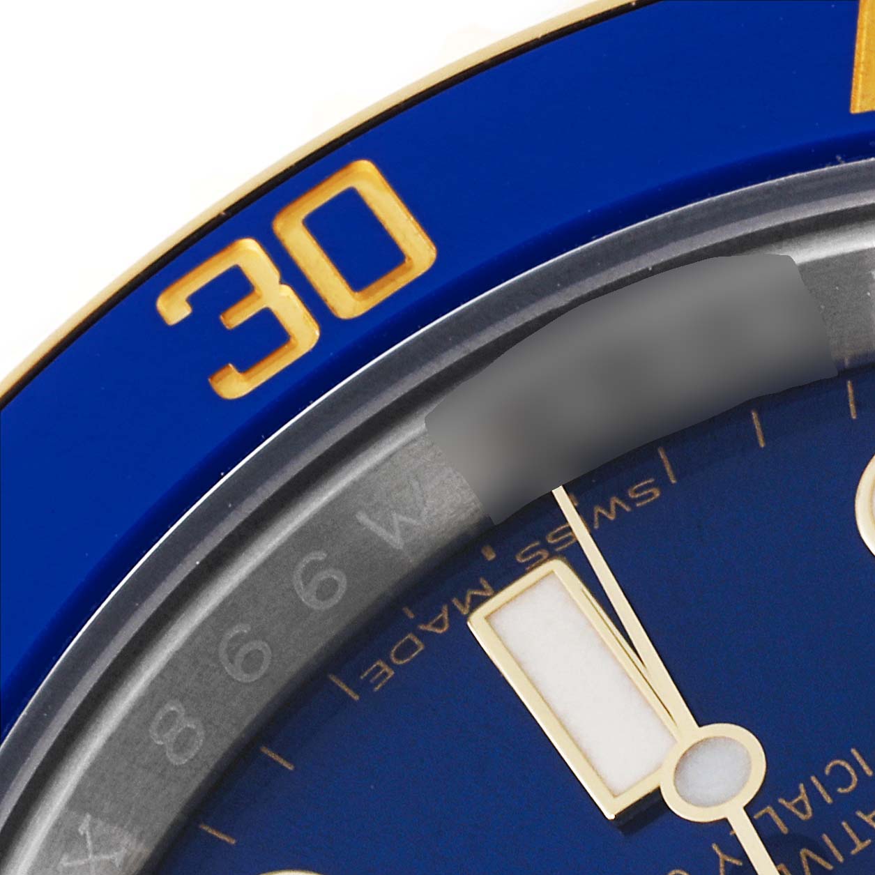The image shows a close-up of the bezel and part of the dial of a Rolex Submariner 116613 Men's Steel and Gold (two tone) Blue Dial 116613 Men's Steel and Gold (two tone) Blue Dial watch, highlighting the "30" mark in gold on a blue background.