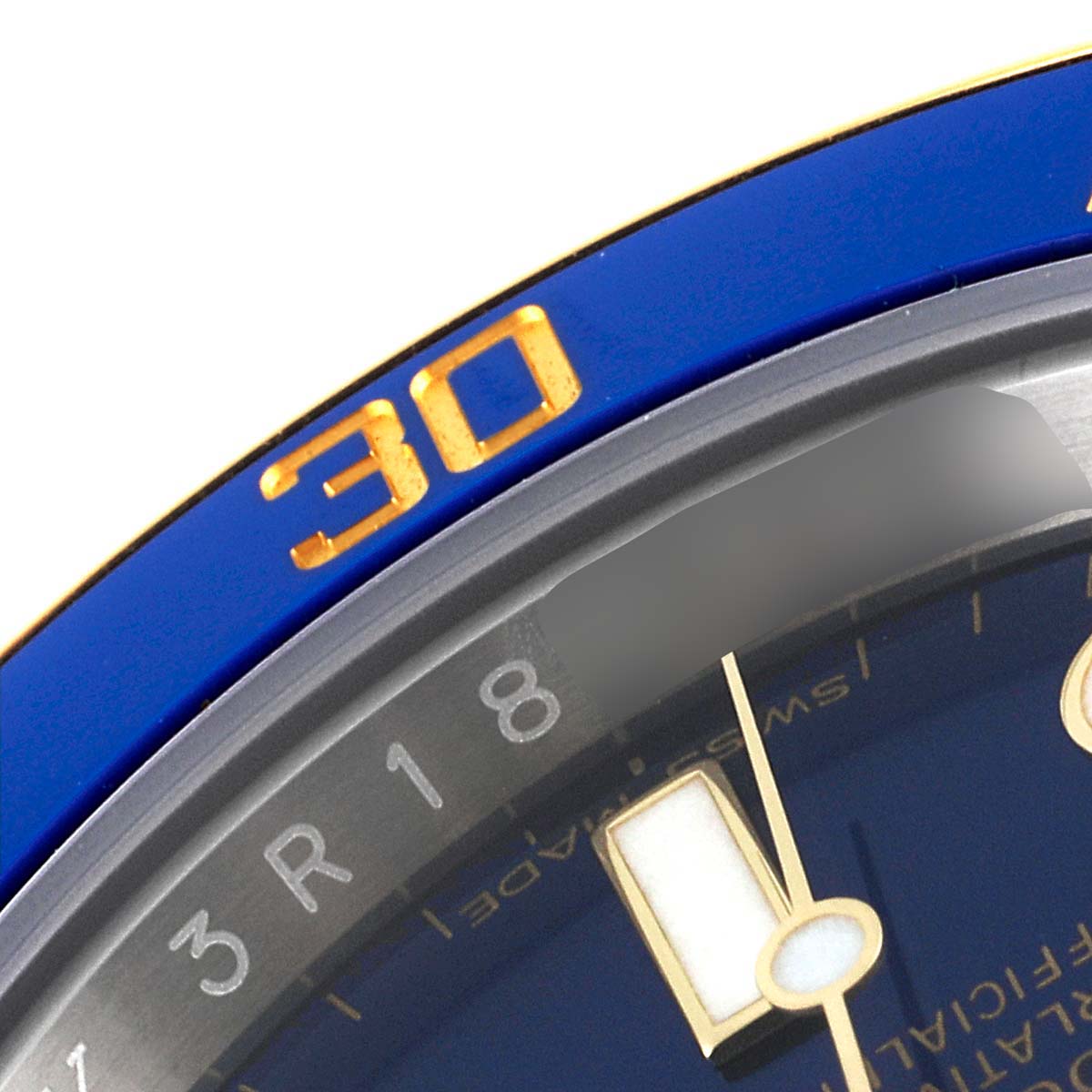 The image shows a close-up of the bezel and part of the dial of the Rolex Submariner 116613 Men's Steel and Gold (two tone) Blue Dial 116613 Men's Steel and Gold (two tone) Blue Dial watch.