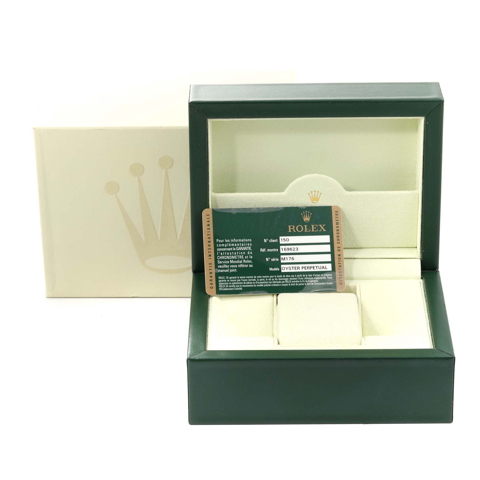 This image shows a Rolex Yacht-Master 169623 Women's Steel and Gold (two tone) Blue Dial 169623 Women's Steel and Gold (two tone) Blue Dial watch box, including the warranty card and cushion.