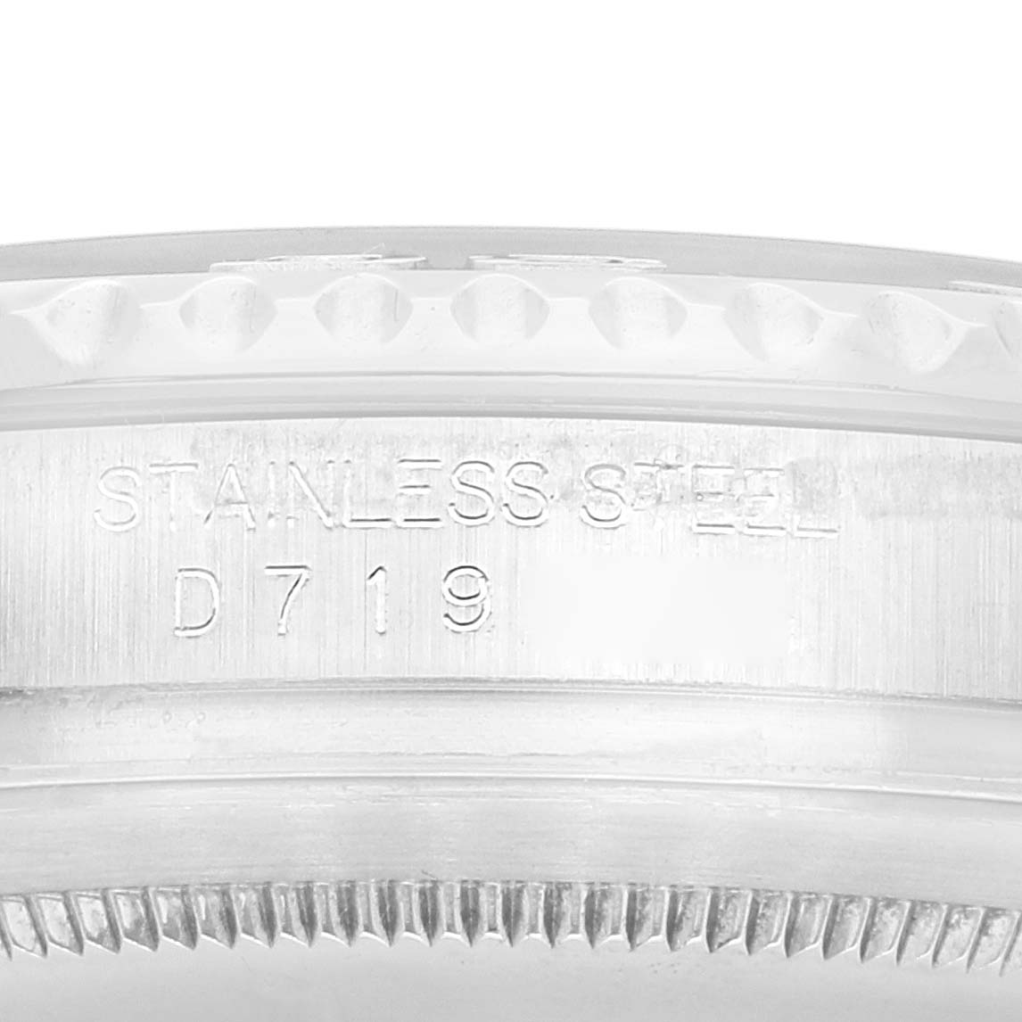 This image shows a close-up view of the side engraving and bezel of a Rolex Yacht-Master 16622 Men's Stainless Steel Silver Dial 16622 Men's Stainless Steel Silver Dial watch made from stainless steel.