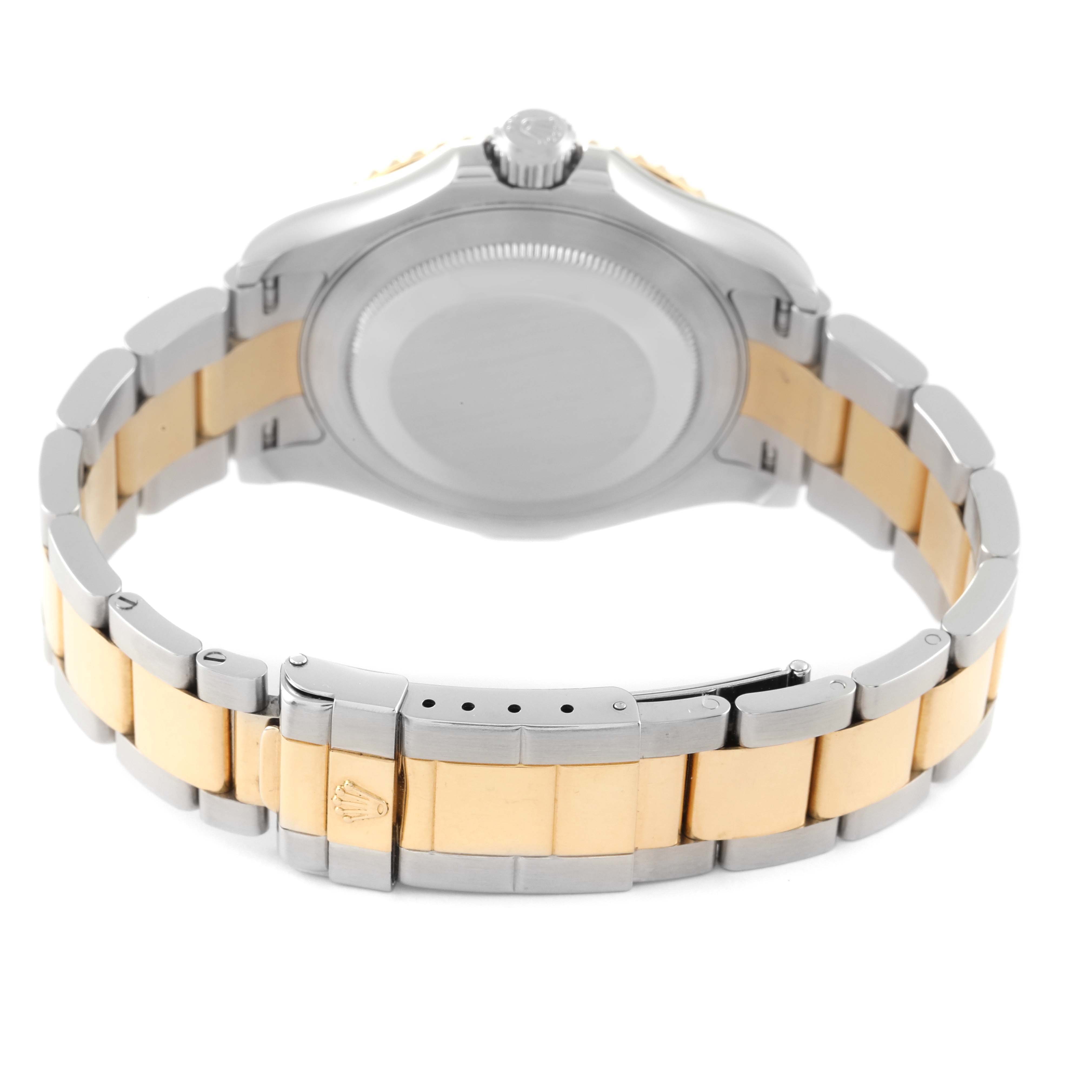 The image shows the back view of a Rolex Yacht-Master 16623 Men's Steel and Gold (two tone) Champagne Dial 16623 Men's Steel and Gold (two tone) Champagne Dial watch, highlighting its two-tone metal bracelet and clasp.