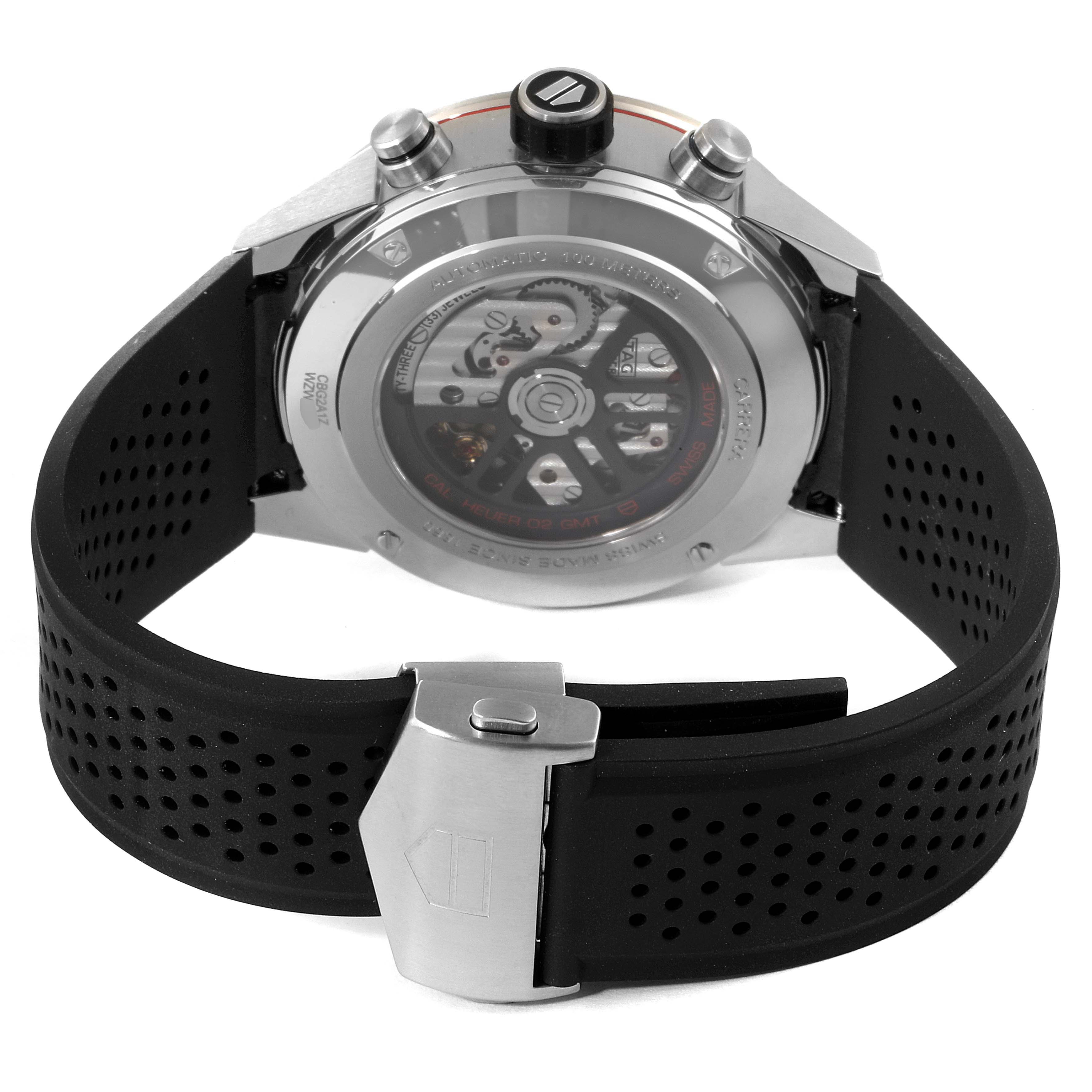 The image shows the back and side view of the Tag Heuer Carrera CBG2A11.FC6460 Men
s Stainless Steel Blue Dial CBG2A11.FC6460 Men
s Stainless Steel Blue Dial watch, highlighting its movement and black perforated strap.