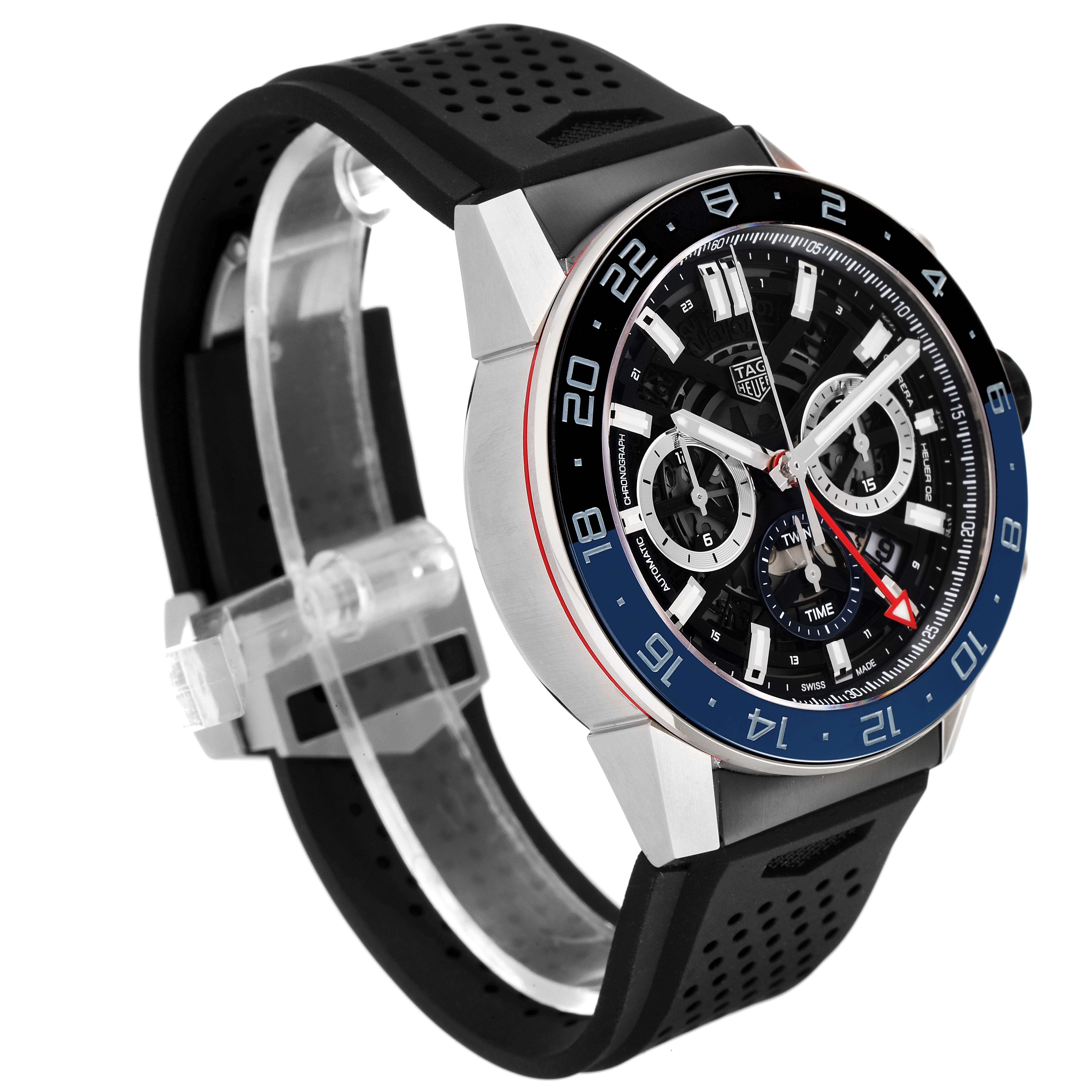 The image shows a side-angle view of a Tag Heuer Carrera CBG2A11.FC6460 Men
s Stainless Steel Blue Dial CBG2A11.FC6460 Men
s Stainless Steel Blue Dial model watch with a black strap and multicolored bezel.
