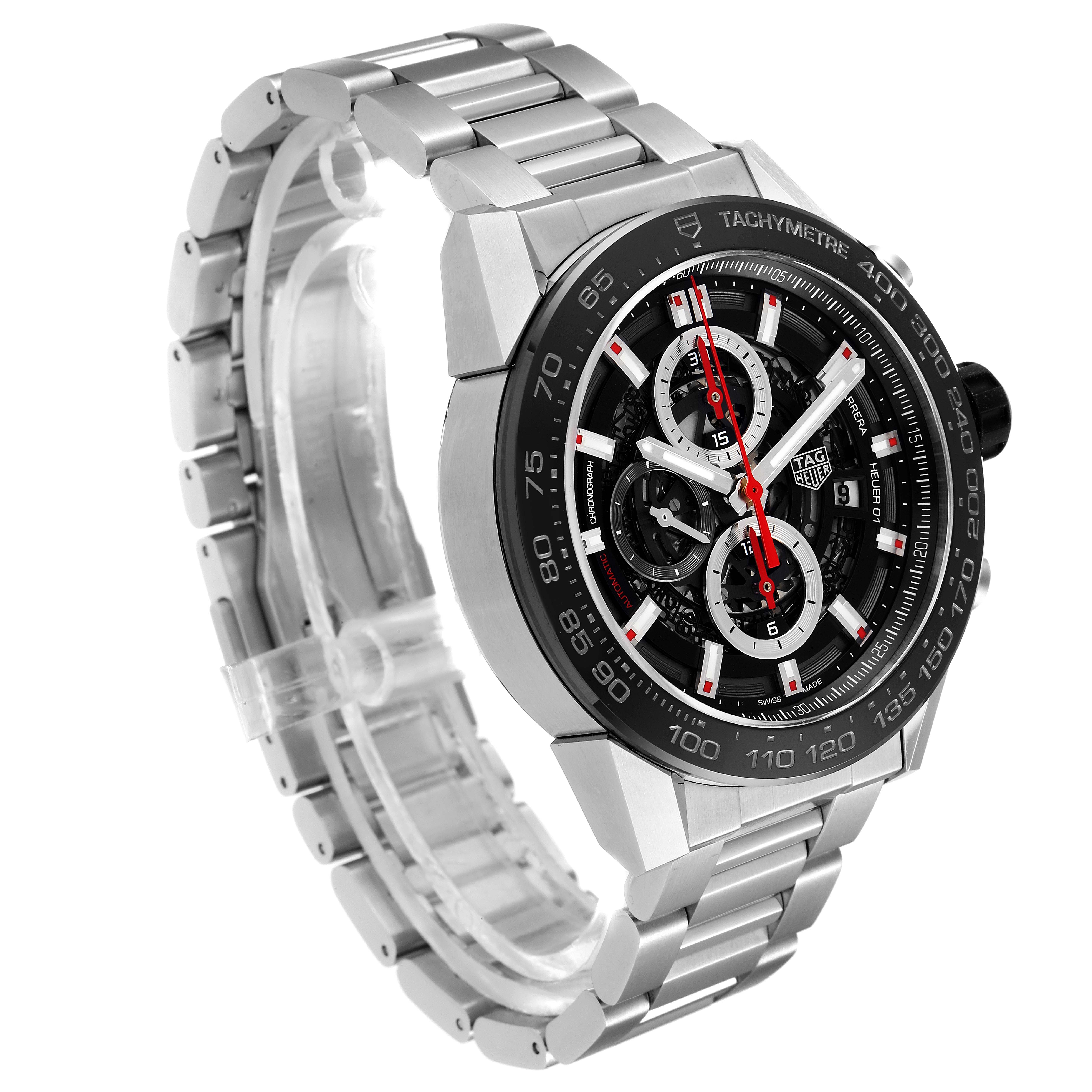 This is an angled view of the Tag Heuer Carrera CAR2A1W.BA0703 Men's Stainless Steel Transparent Dial CAR2A1W.BA0703 Men's Stainless Steel Transparent Dial watch showcasing its stainless steel band, black dial, chronographs, and tachymeter bezel.